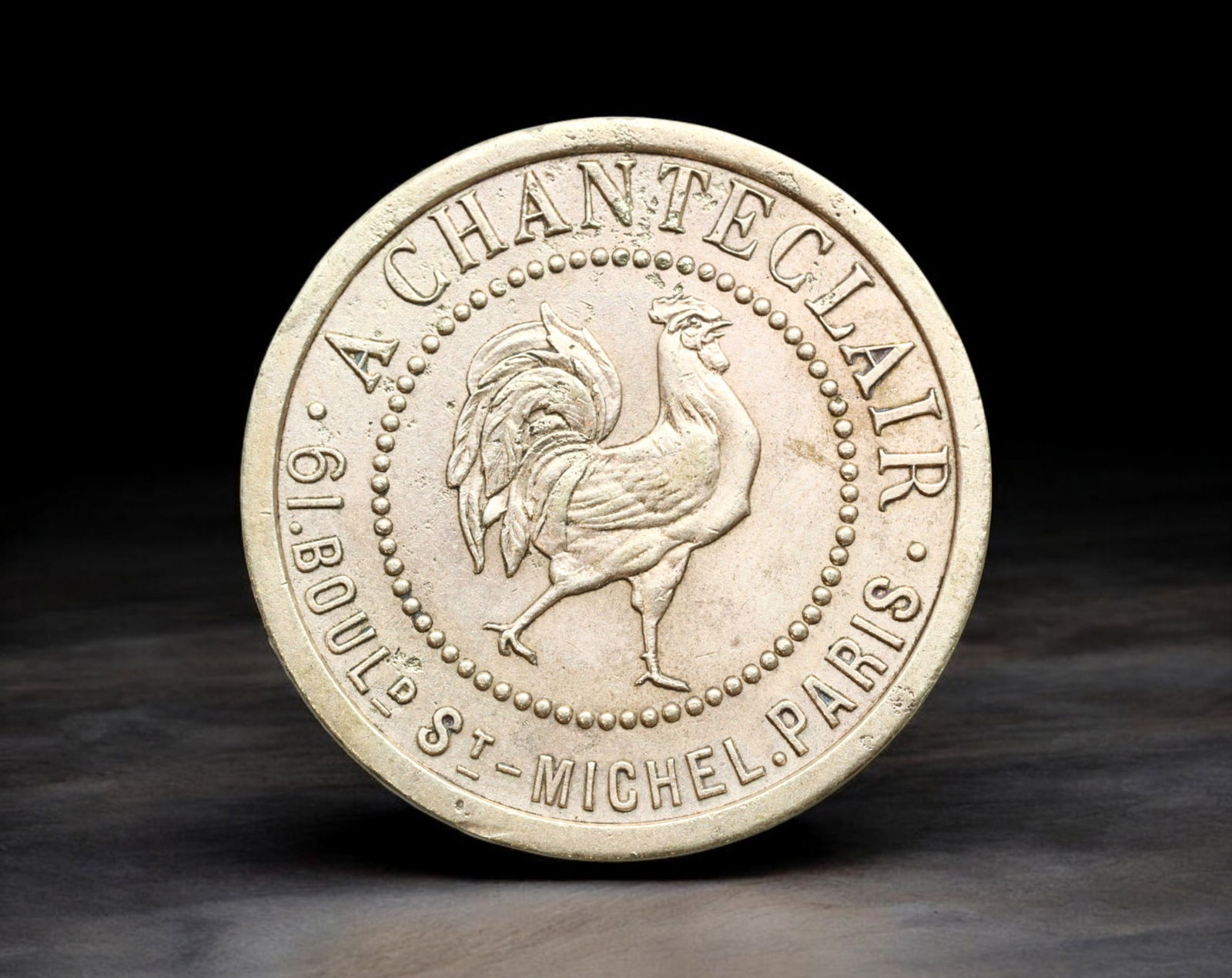 FRANCE: Paris - Brass Token, A Chanteclair, 61 Blvd St-Michel, ND (27mm, 5.4g) (1 of 2)