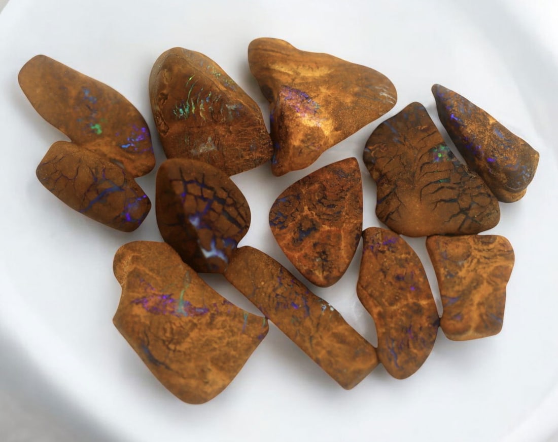 AUSTRALIAN MATRIX BOULDER OPAL - Rough Lot, 1.5-2.8cm, 29g: A striking lot of natural Australian matrix boulder opal rough. These raw specimens display mesmerizing flashes of blue, green, and gold veins running through ironstone, characteristic of high-quality