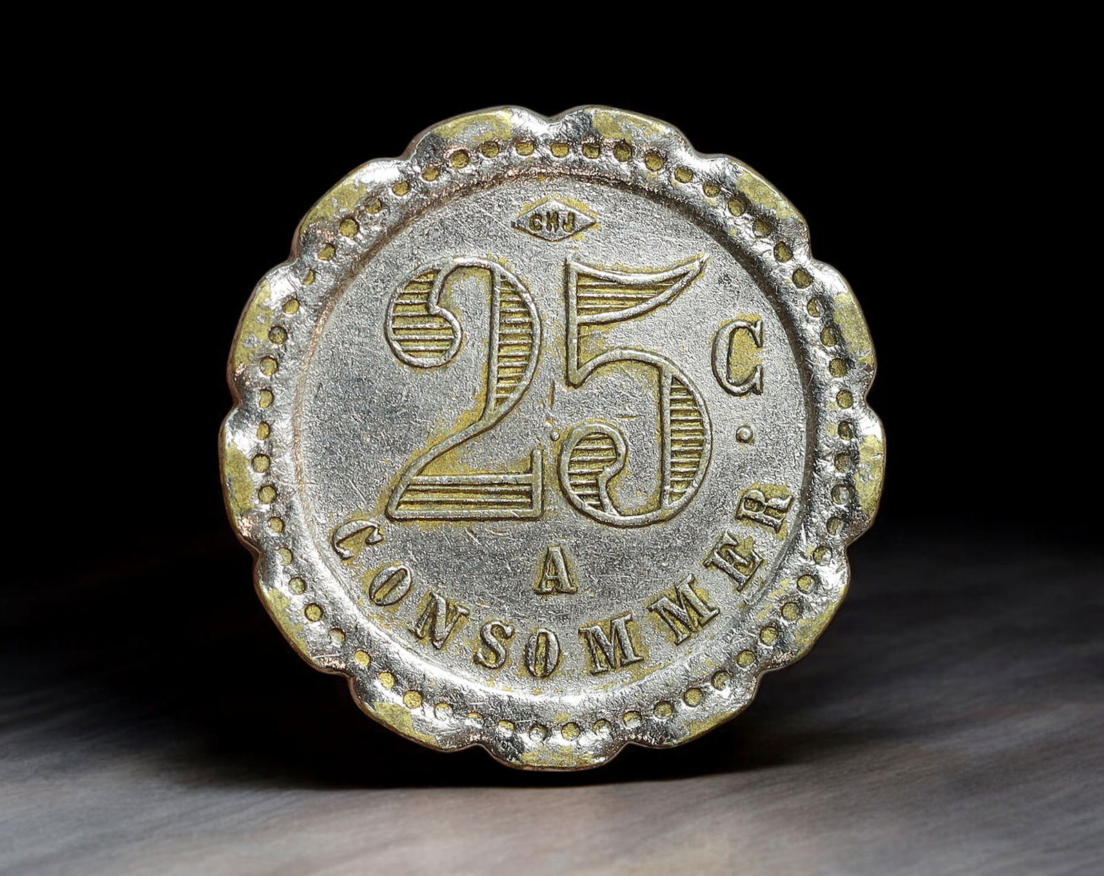 FRANCE: Scalloped Brass Token - A Consommer 25 Centimes Coin, c.1920s (18mm, 2.6g).: Struck in brass with an eye-catching scalloped edge, this 25 centimes "A Consommer" token is a beautifully preserved example of early 20th-century French commercial exonumia. The obverse features a st
