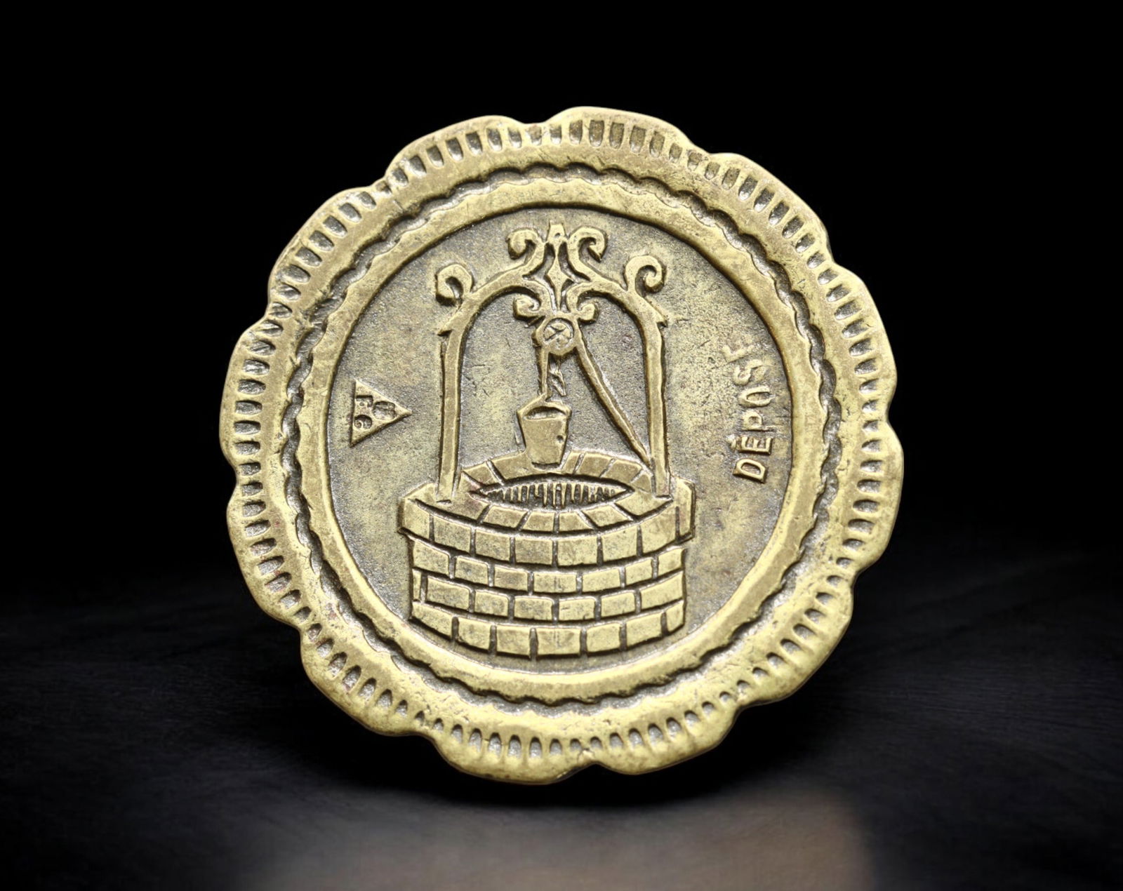 FRANCE: Arcade Token - Brass 20 Centimes "A Consommer" with Well Design, ca. 1902-1937 (19mm, 2.6g) (1 of 2)