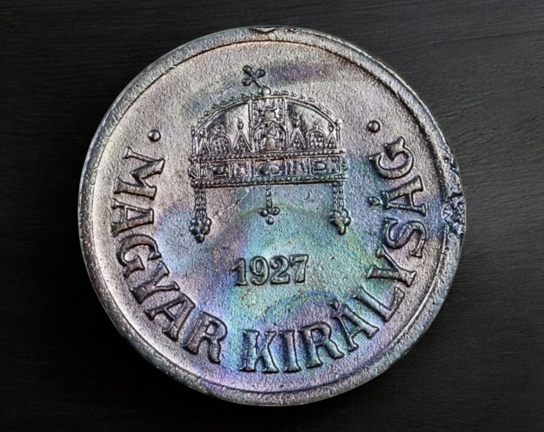 HUNGARY: 2 Filler Coin Coin, 1927 Budapest - Nickel Coin Pattern Issue: A 1927 2 Filler Coin struck at the Budapest Mint, an exceptional pattern issue in Nickel Coin, weighing 3.3g and measuring 19mm in diameter. The obverse features the Hungarian Holy Crown above the dat