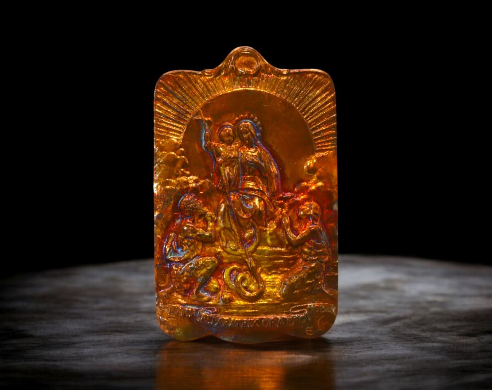 MEXICO: Virgin of Guadalupe Plaque - 400th Anniversary, 1958: A 4x3cm, 4g plaque celebrating the 400th anniversary of the Virgin of Guadalupe's apparition in 1958. The stunning piece depicts the Virgin Mary with rays of light emanating behind her, cradling the i