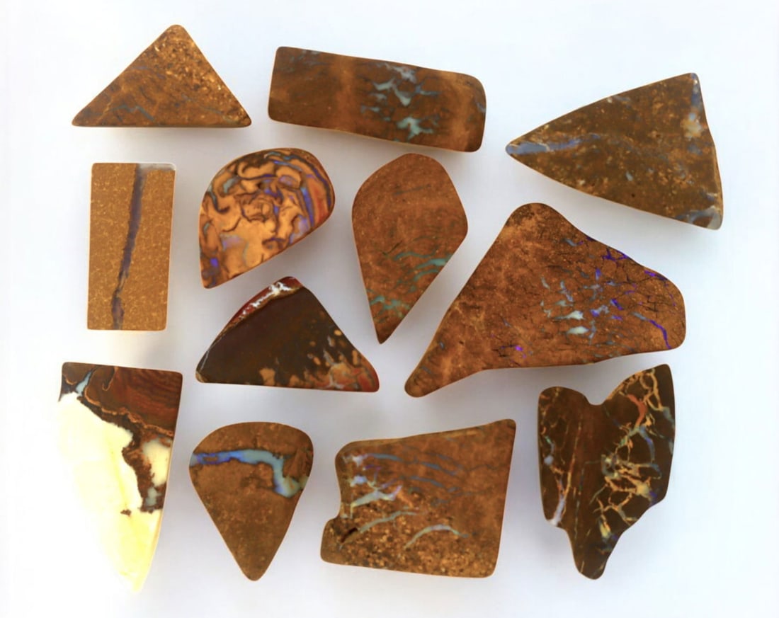 AUSTRALIA: Matrix Boulder Opal Preform Rough Lot, 20g, 1-2.5cm Each: A stunning selection of matrix boulder opal rough, sourced from Australia's renowned opal fields in Queensland. These preform-cut rough specimens display vivid flashes of blue, green, and purple opale