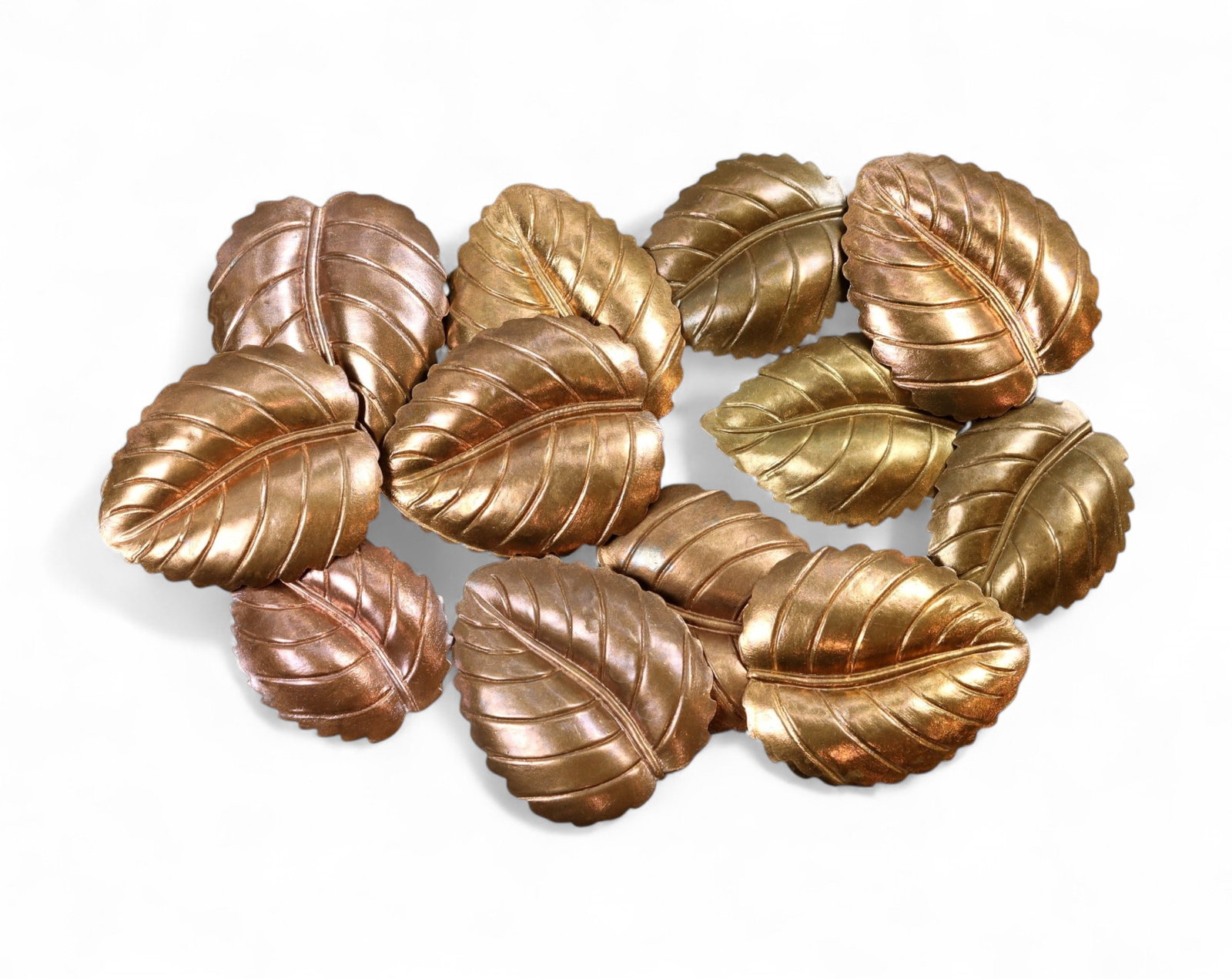VINTAGE MIXED ERA: Leaf Motif Mount Lot - Curved Botanical Forms, 3cm (12 pcs): An elegant grouping of twelve vintage decorative mounts, showcasing richly molded leaf motifs in complementary goldtone and bronzetone finishes. Each piece features detailed veining and softly sculpte