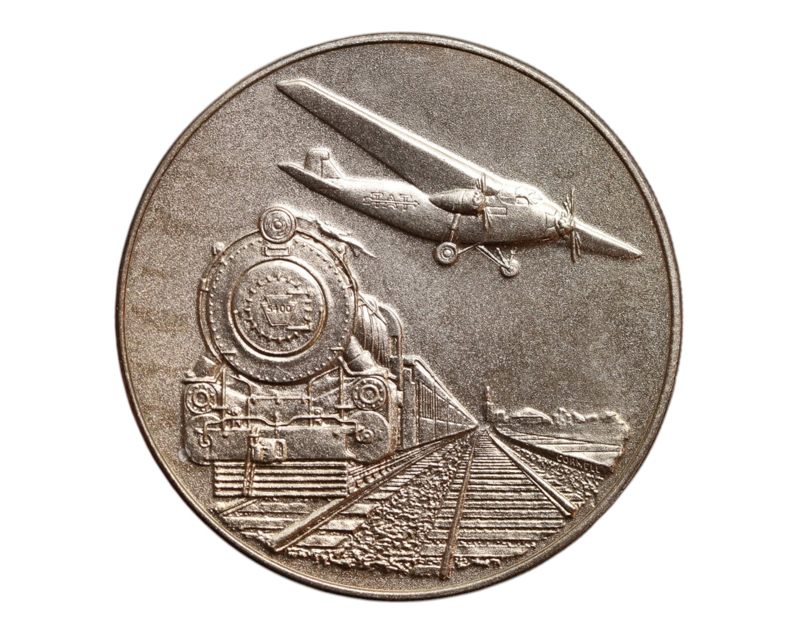 UNITED STATES: TWA - 40th Anniversary Transcontinental Rail-Air Service Coin, 1969 (32mm): Struck by the Franklin Mint in 1969, this commemorative coin honors the 40th anniversary of the groundbreaking transcontinental rail-air service inaugurated by TWA on July 7, 1929. The obverse present