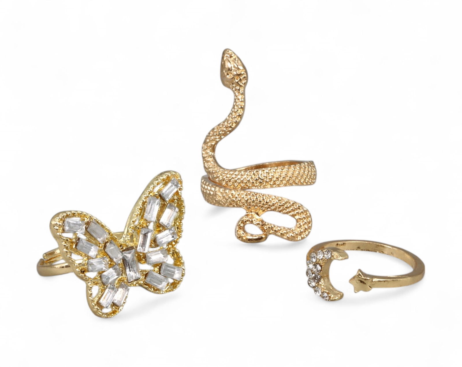 MODERN ROMANTIC STYLE: Ring Trio - Butterfly, Serpent & Celestial Motifs, US Size 6-6.5: Blending whimsical charm with symbolic artistry, this curated trio of rings captures the spirit of modern romantic styling. Included are a butterfly form ring pave-set with baguette-cut clear stones,