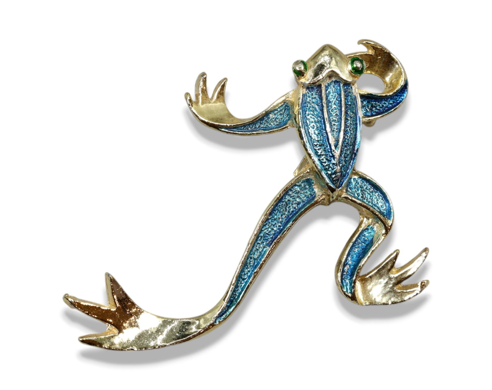 WHIMSICAL MID-CENTURY STYLE: Brooch-Leaping Frog with Blue Enamel and Green Eyes,Signed Gerry's 5 cm: A lively mid-century brooch by Gerry's featuring a whimsical leaping frog rendered in bright goldtone with vibrant blue enamel panels and green stone-like eyes. The stylized form and playful posture m