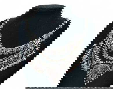 Tribal-Inspired Statement Necklace - Tiered Drops, Floral Etching, Oxidized Silvertone (60 cm): Rich in symbolic detail and visual weight, this 60 cm statement necklace channels tribal and nature-inspired themes through layered teardrop, floral, and geometric motifs. Rendered in oxidized silvert