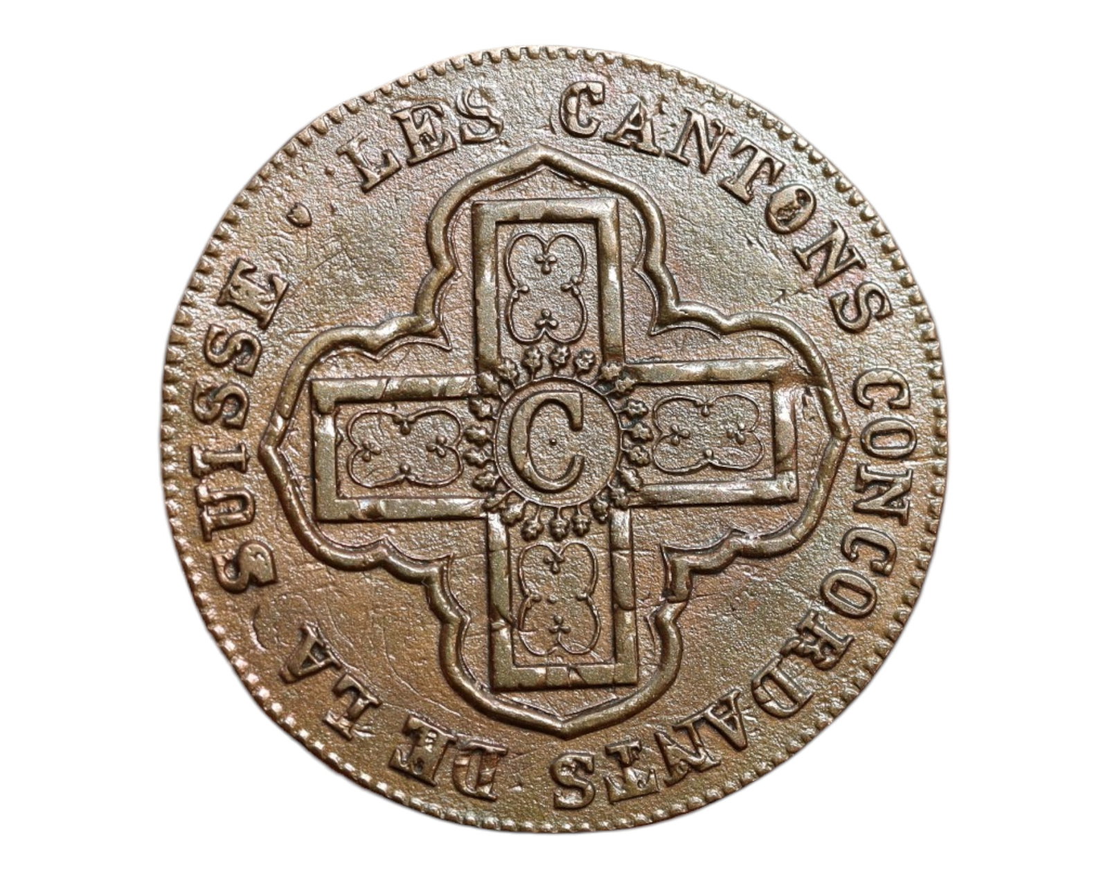 SWITZERLAND/VAUD: Liberty and Homeland - 1 Batzen Coin, 1828, 25mm: Rooted in the revolutionary spirit of the Swiss cantonal era, this 1828 1 Batzen coin from Vaud boldly proclaims ideals of self-rule and national pride. The obverse features an intricate cross motif s