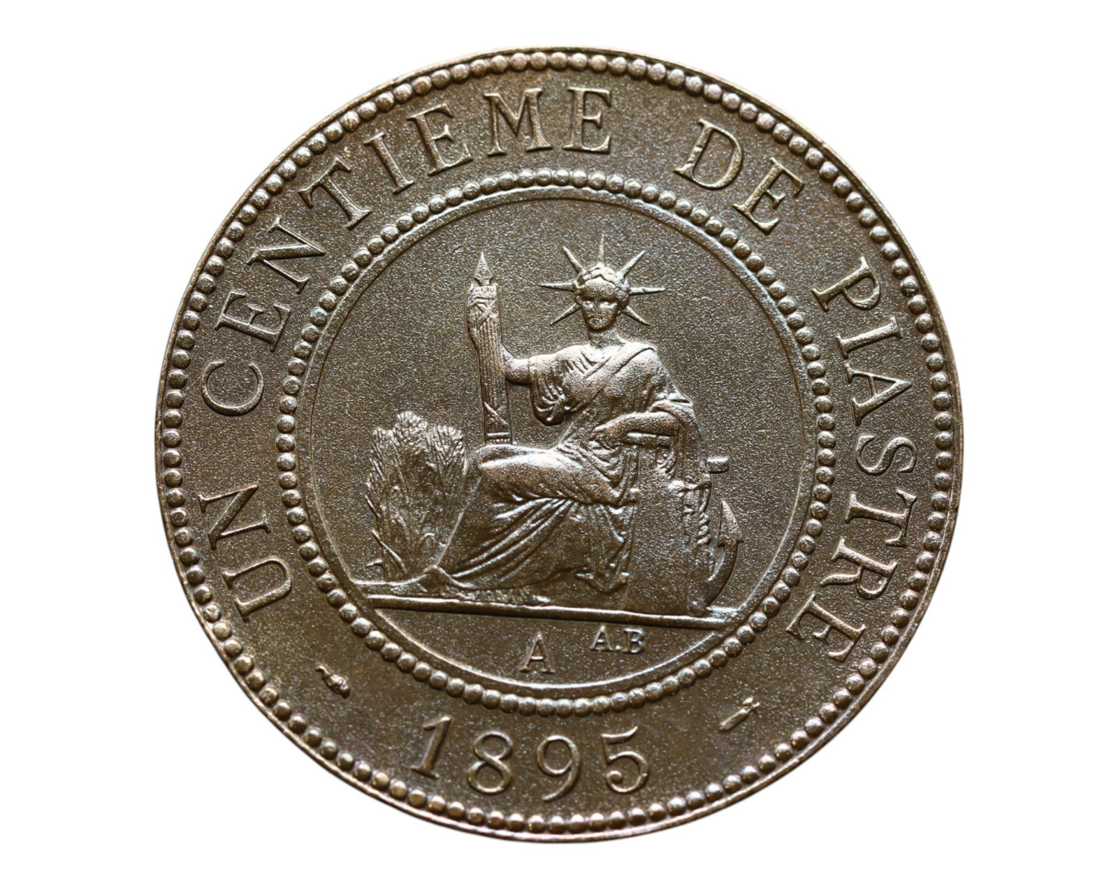 FRENCH INDO-CHINA: Colonial Prosperity - Un Centieme de Piastre Coin, 1895 A Paris Mint, 31mm: Issued during the height of French imperial ambition in Southeast Asia, this 1895 Un Centieme de Piastre reflects a symbolic narrative of colonial order and economic expansion. Seated triumphantly, th
