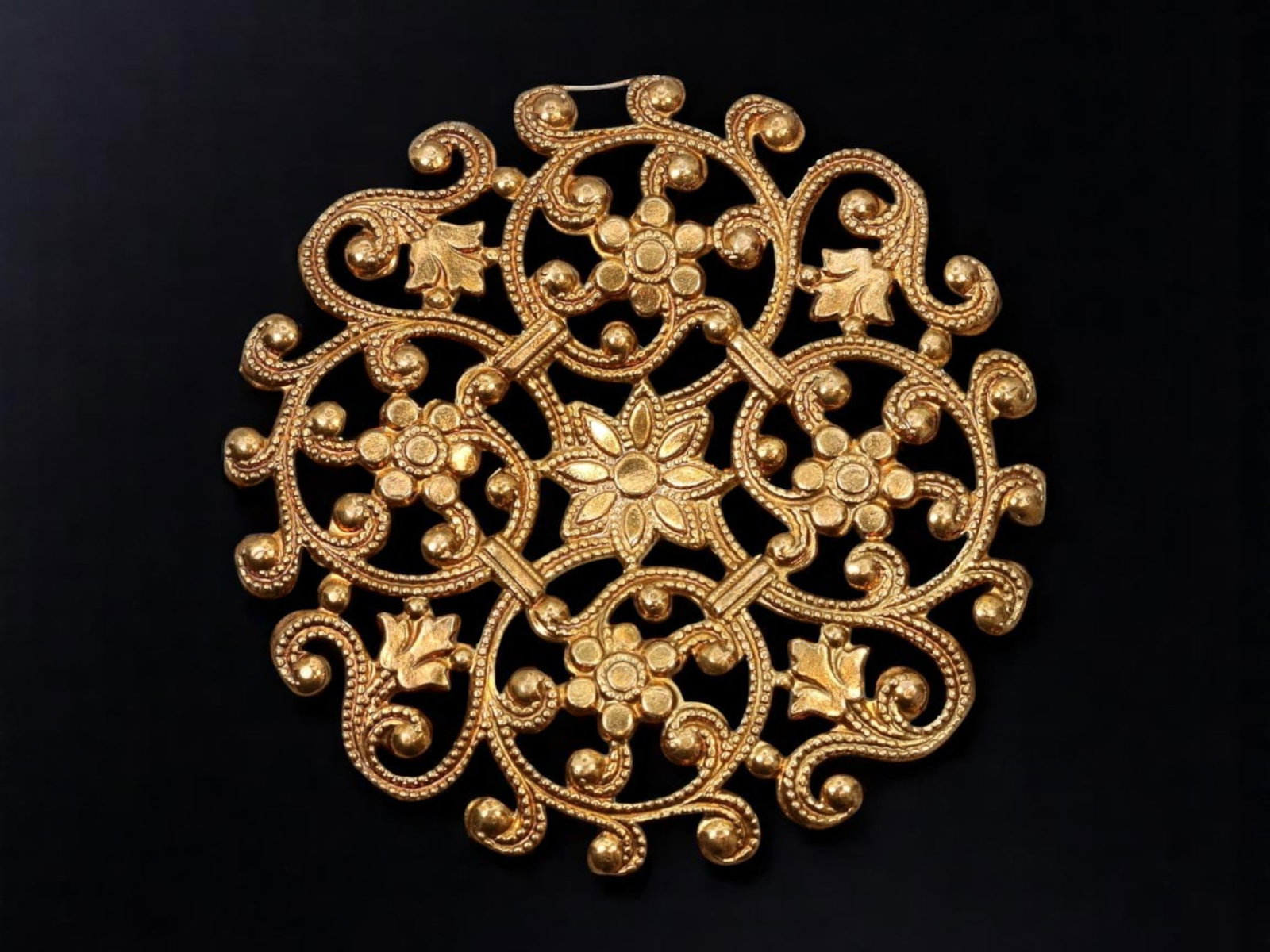 VICTORIAN REVIVAL: Filigree Medallion - Floral Rosette & Scrollwork Mandala, Gilt Openwork (5cm): Evoking the romantic intricacy of late 19th-century metalwork, this Victorian Revival medallion features a symmetrical mandala of scrolling tendrils and floral rosettes arranged in openwork formation.