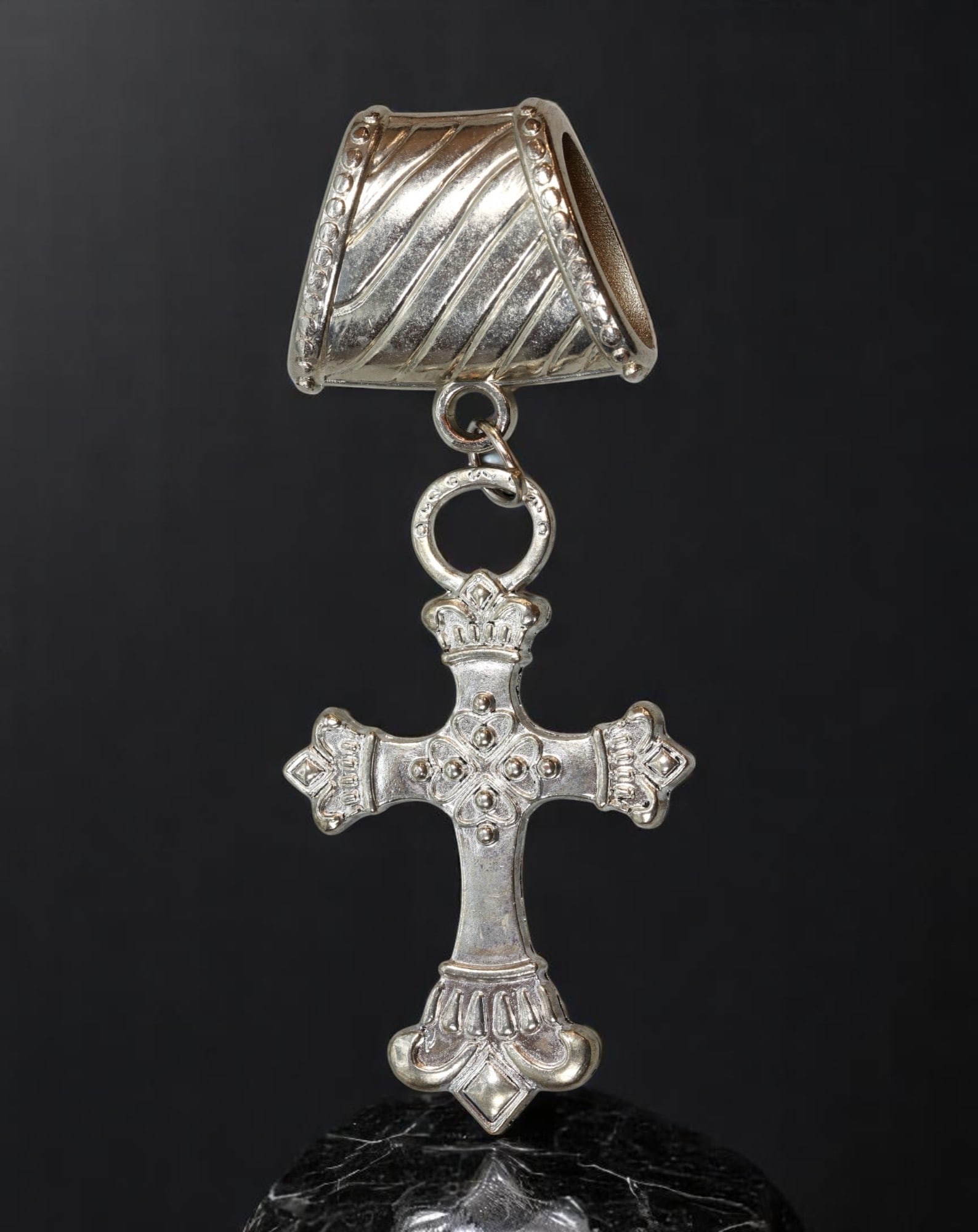 VINTAGE LARGE CROSS PENDANT - Ornate Crown Tips & Diagonal Bail, Silvertone Relief Finish, 11x4.5cm: From an estate jewelry collection, this bold vintage pendant features a large cross drop with regal crown-style terminals and a softly textured reverse. Cast in silvertone with raised detailing and ti