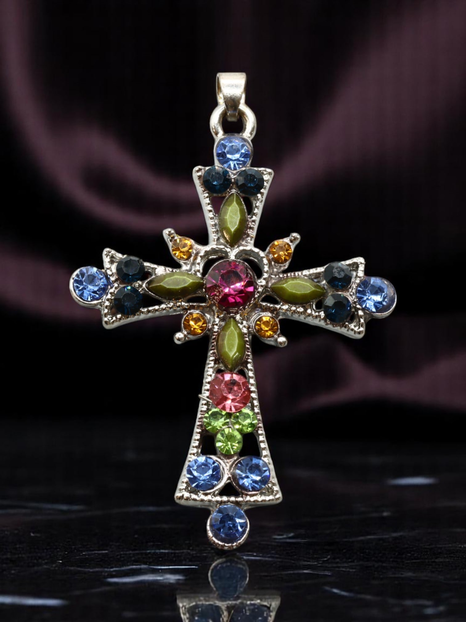 MODERN ROMANTIC: Cross Pendant - Multicolor Stones, Floral Motif & Silvertone Setting, 5x3.5cm: From a stylized estate collection, this ornate silvertone cross pendant is set with an array of vibrant multicolor stones-rose pink, blue, green, amber, and deep sapphire-arranged in a subtly floral p