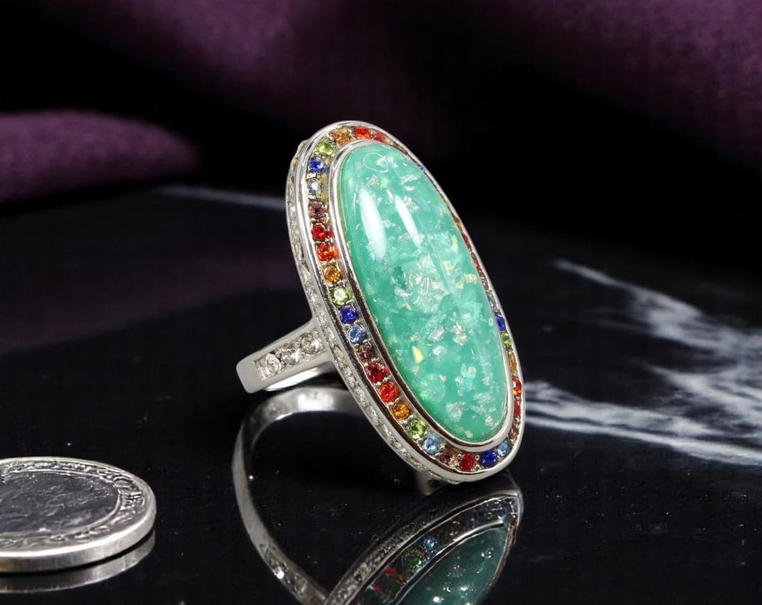 BOLD STATEMENT ERA: Elongated Oval Ring - Aqua Center, Rainbow Gem Halo, Size 7 US (1 of 2)