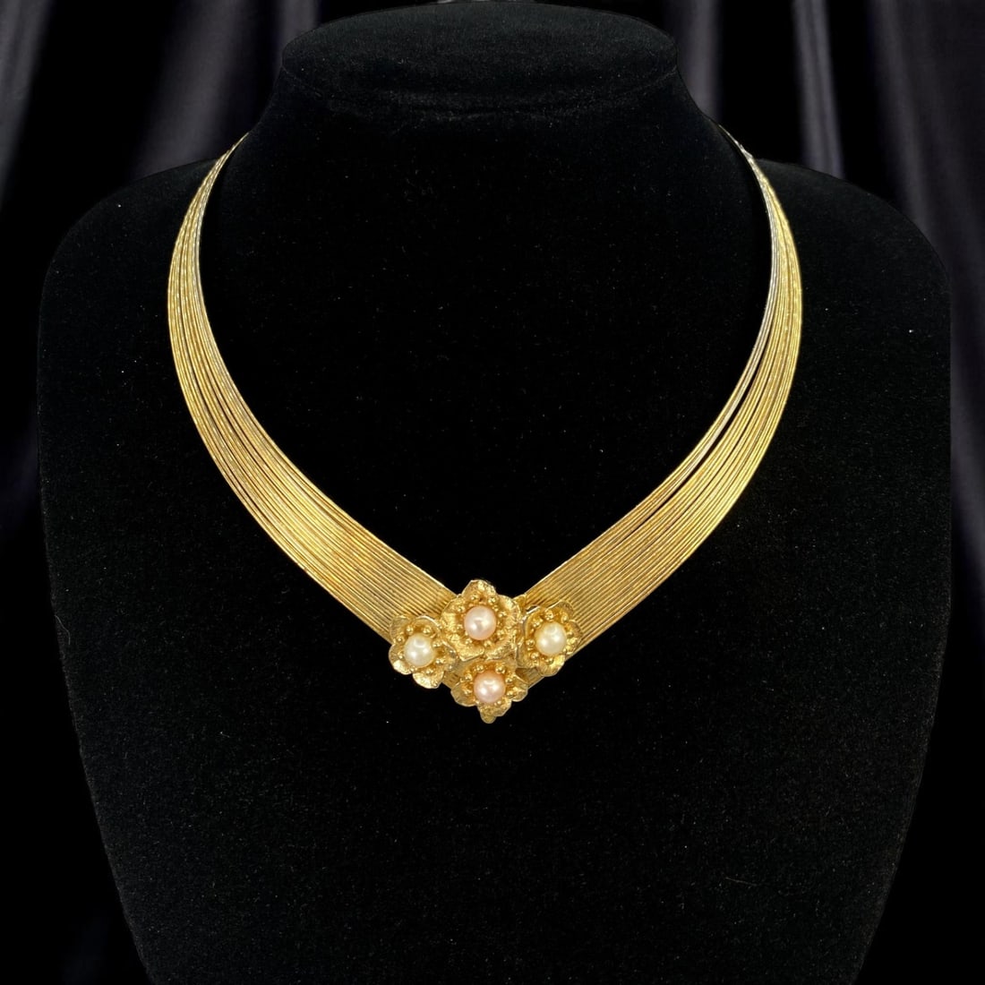 Collar Necklace - Rosette Cluster with Pearl-like Accents, Goldtone Finish (16 cm): A richly sculpted mid-century collar necklace with a bold yet graceful silhouette, this piece blends the structured elegance of fine goldtone wirework with a romantic rosette centerpiece. Four pearl-l