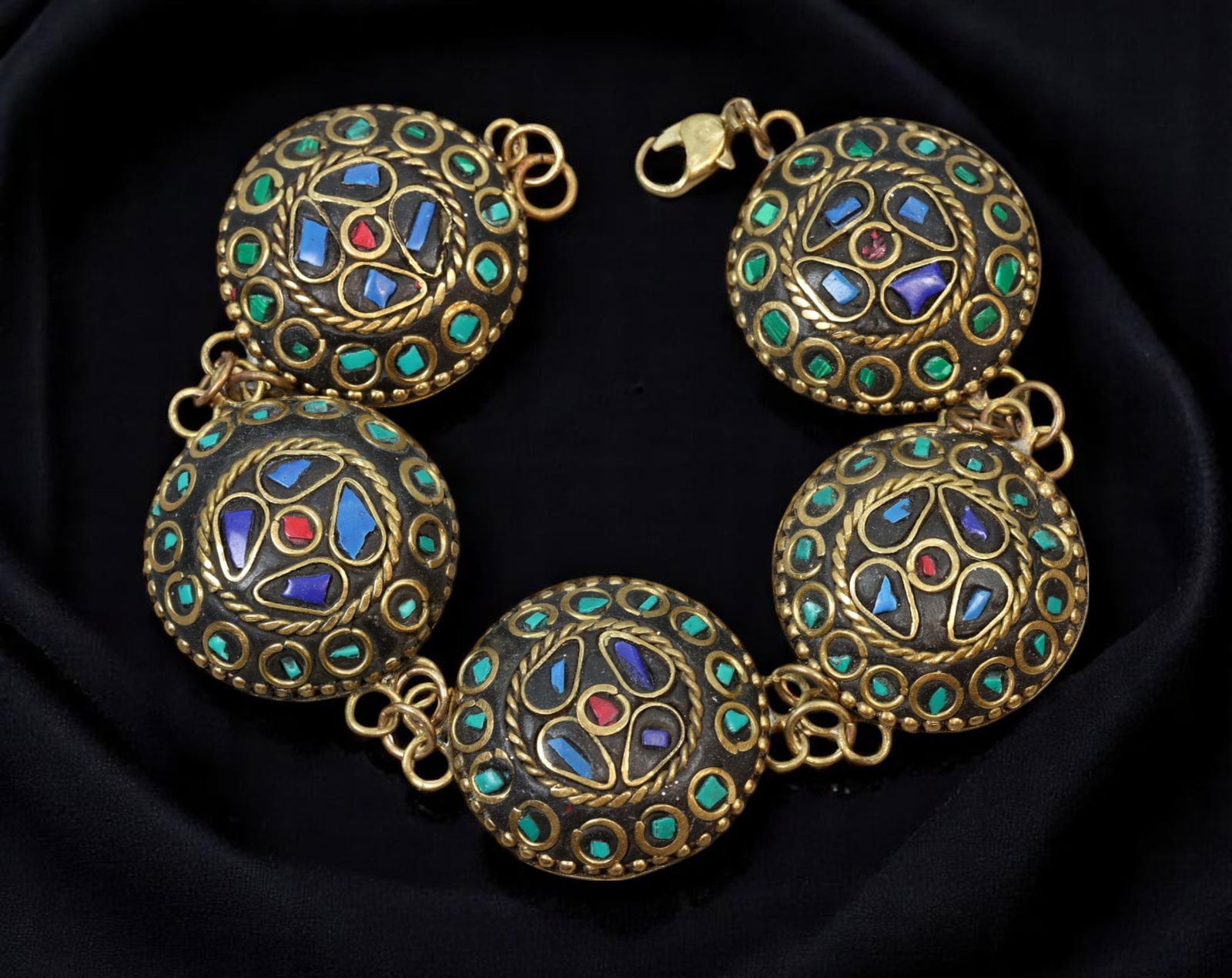 ARTISTIC MODERN STYLE:Domed Medallion Bracelet-Mosaic Inset,Ropetwist Detail Aged Bronzewash, 20cm: A bold and intricate design, this artistic bracelet features five domed medallions linked in succession, each set with vibrant mosaic-like insets of ruby-like, sapphire-blue, and emerald-green stones.