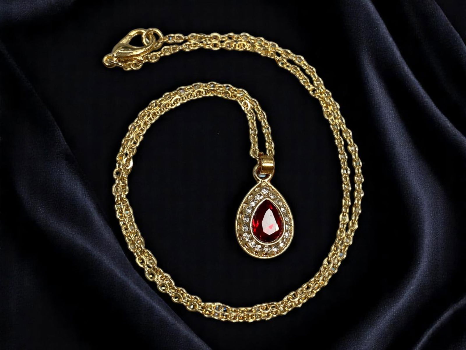 Necklace - Teardrop Ruby-Like Center, Clear Stone Halo, Goldtone Chain 42cm (1 of 2)