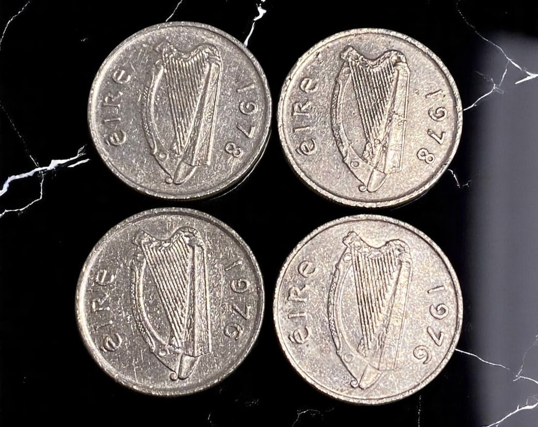 IRELAND: 5 Pence Coins - Bull Design & Harp Emblem, 4 pcs (1976 & 1978, 23mm): A solid 4-piece set of Irish 5 Pence coins, dated 1976 and 1978, each measuring 23mm in diameter. The obverse features the iconic Irish harp, the official national symbol of Ireland, with the country 
