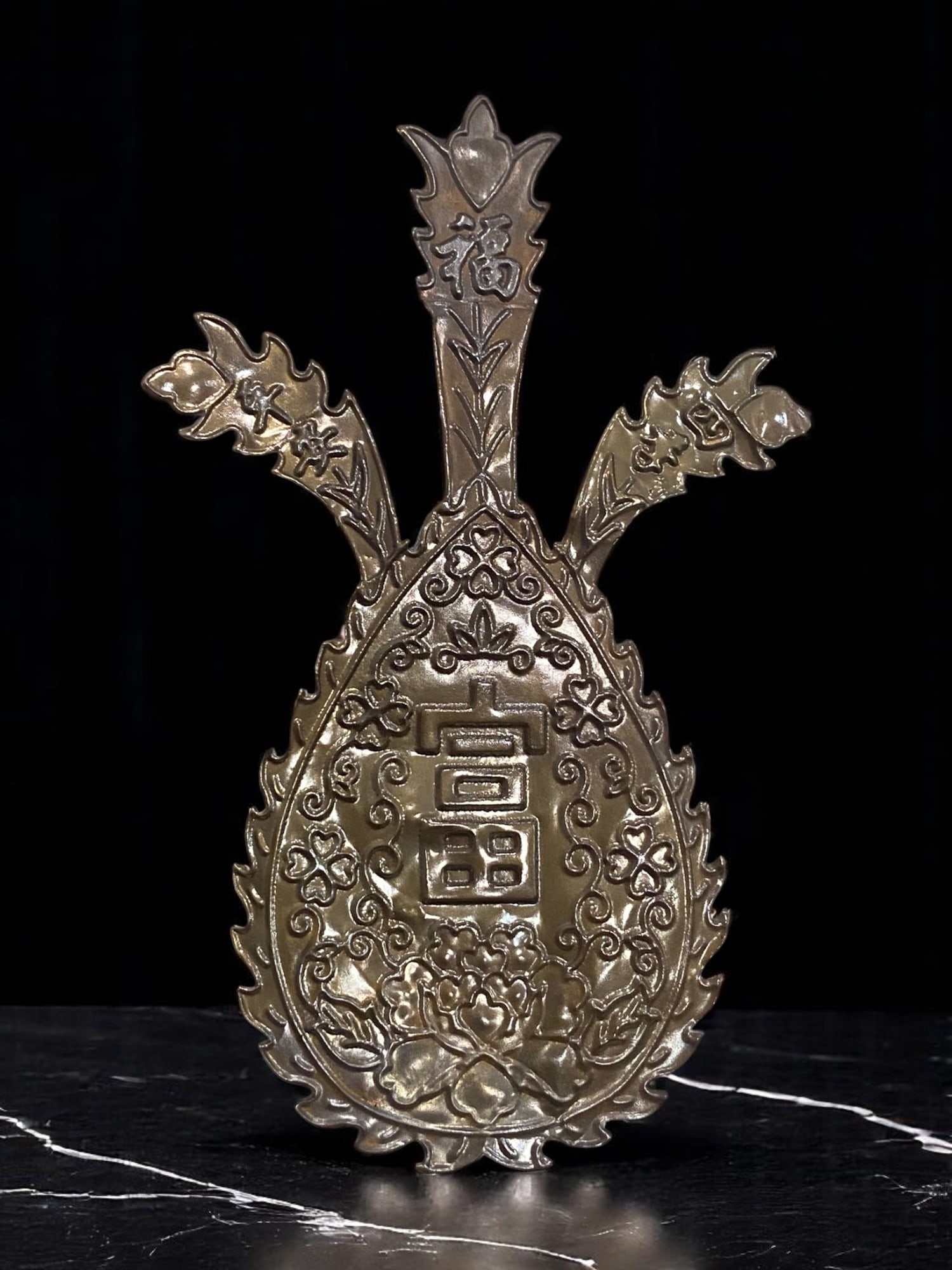 Bronze Plaque - Chinese Symbolism, Stylized Floral & Calligraphy Motifs (14.5 x 9 cm): A beautifully cast bronze plaque, richly textured with a stylized leaf border and ornate floral motifs framing bold Chinese calligraphy. The central characters represent prosperity (), flanked by addi