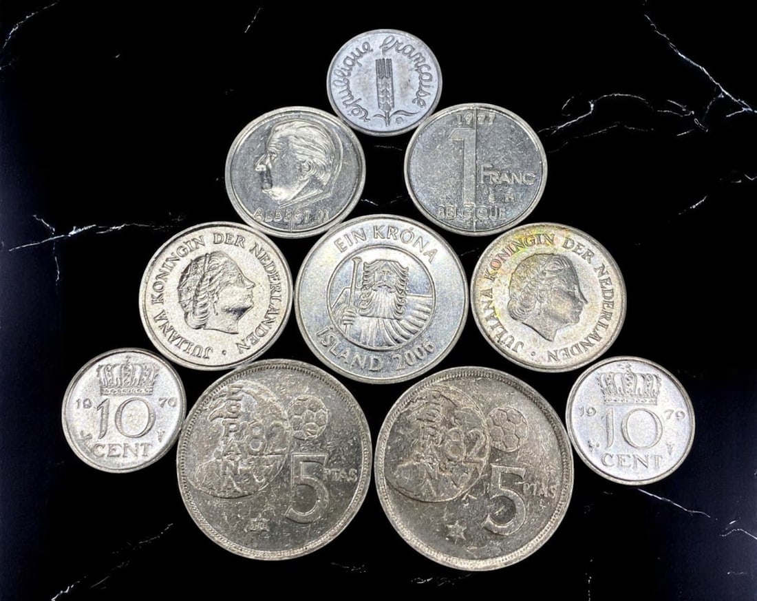 EUROPE: Mixed Nations - 10 Coin Lot, 1960-2006 (14-22mm): This 10-coin lot offers a compact yet diverse journey through European coinage from the postwar period to the early 21st century. Included are Dutch 10 and 25 Cent coins bearing the profile of Queen J