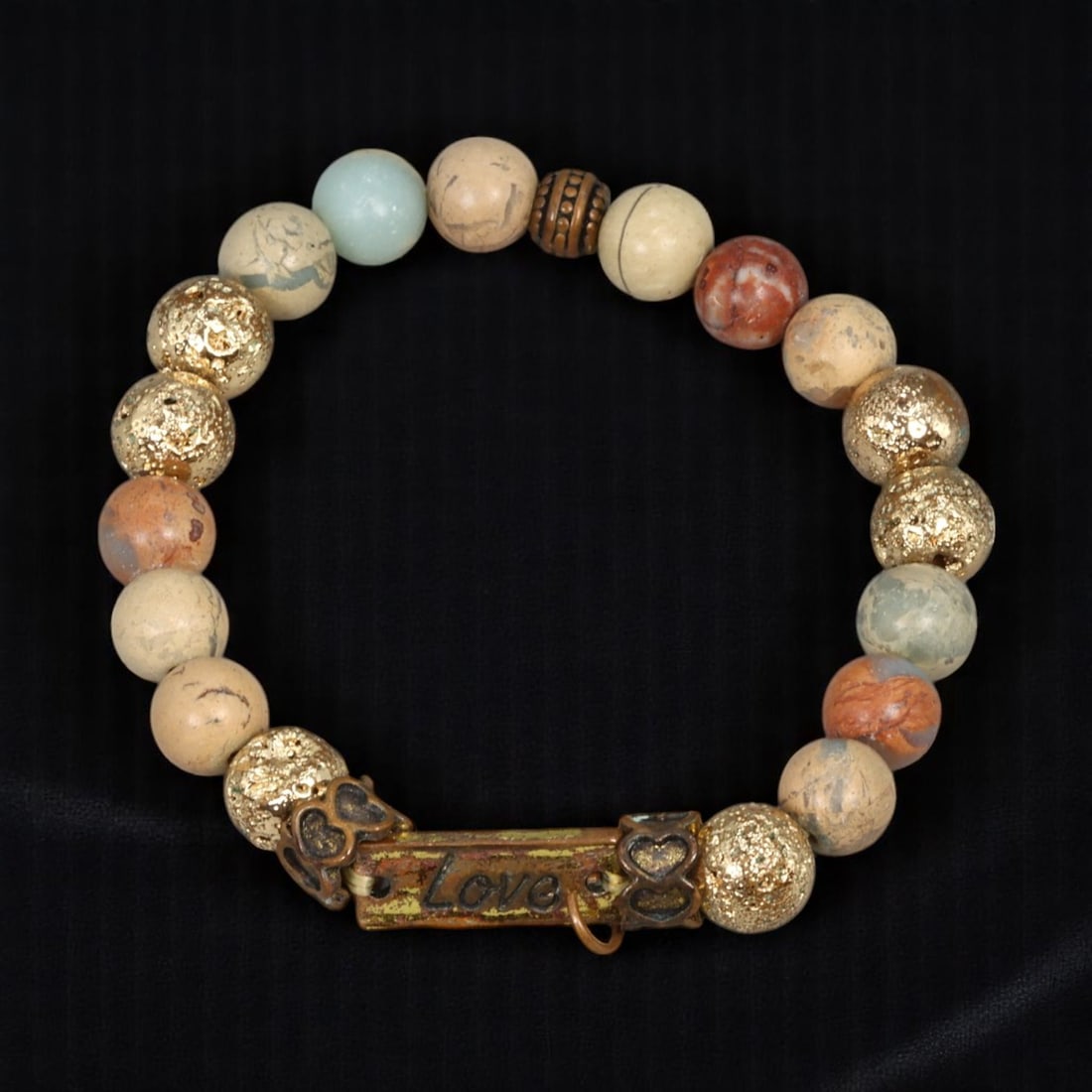 MID-CENTURY: Estate Bracelet - Mixed Beads with "Love" Plaque Accent, 17cm: A charming example of Estate jewelry, this vintage mid-century bracelet combines earthy tones and textures in a tactile mix of marbled stone-like beads, metallic textured spheres, and a rustic central