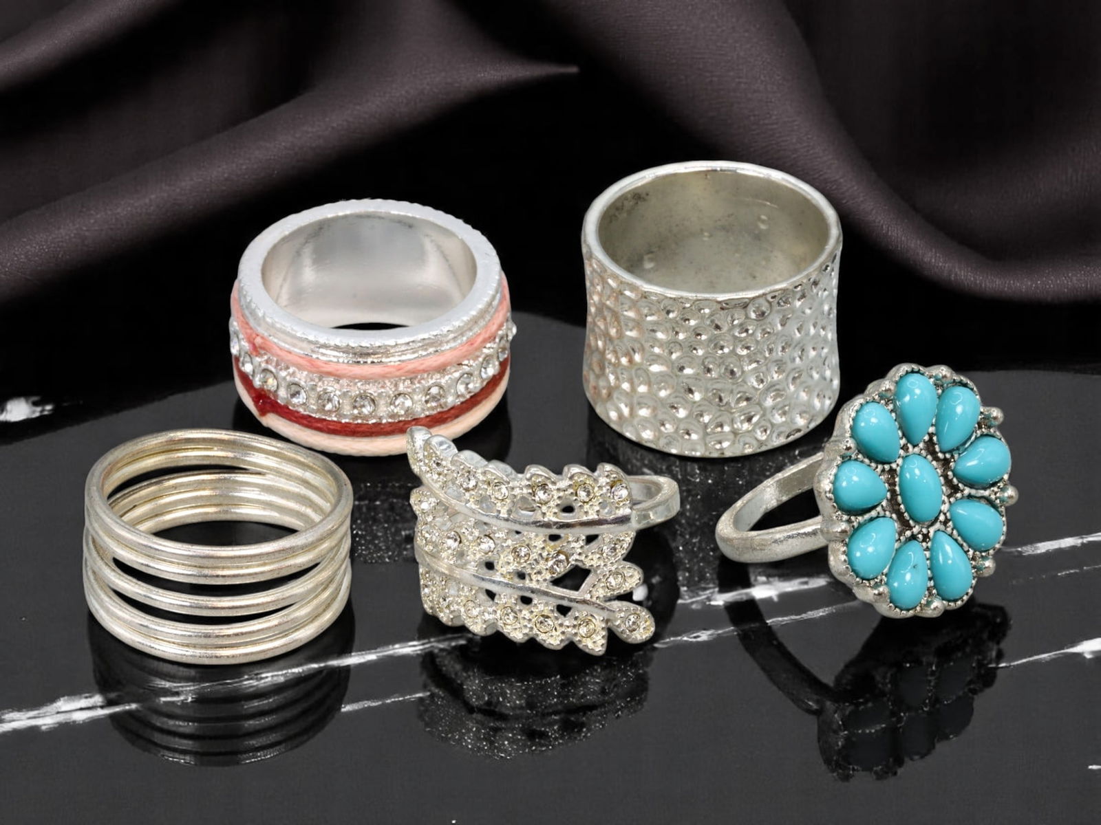 5 Ring Lot - Textured, Sculptural & Gem-Look Styles, Silvertone & Turquoise Accents, 6-8.75 US: A dynamic lot of five vintage rings offering diverse sculptural forms and finishes. This curated selection includes: a wide silvertone band with clear brilliant-cut stone accents framed by soft pink a