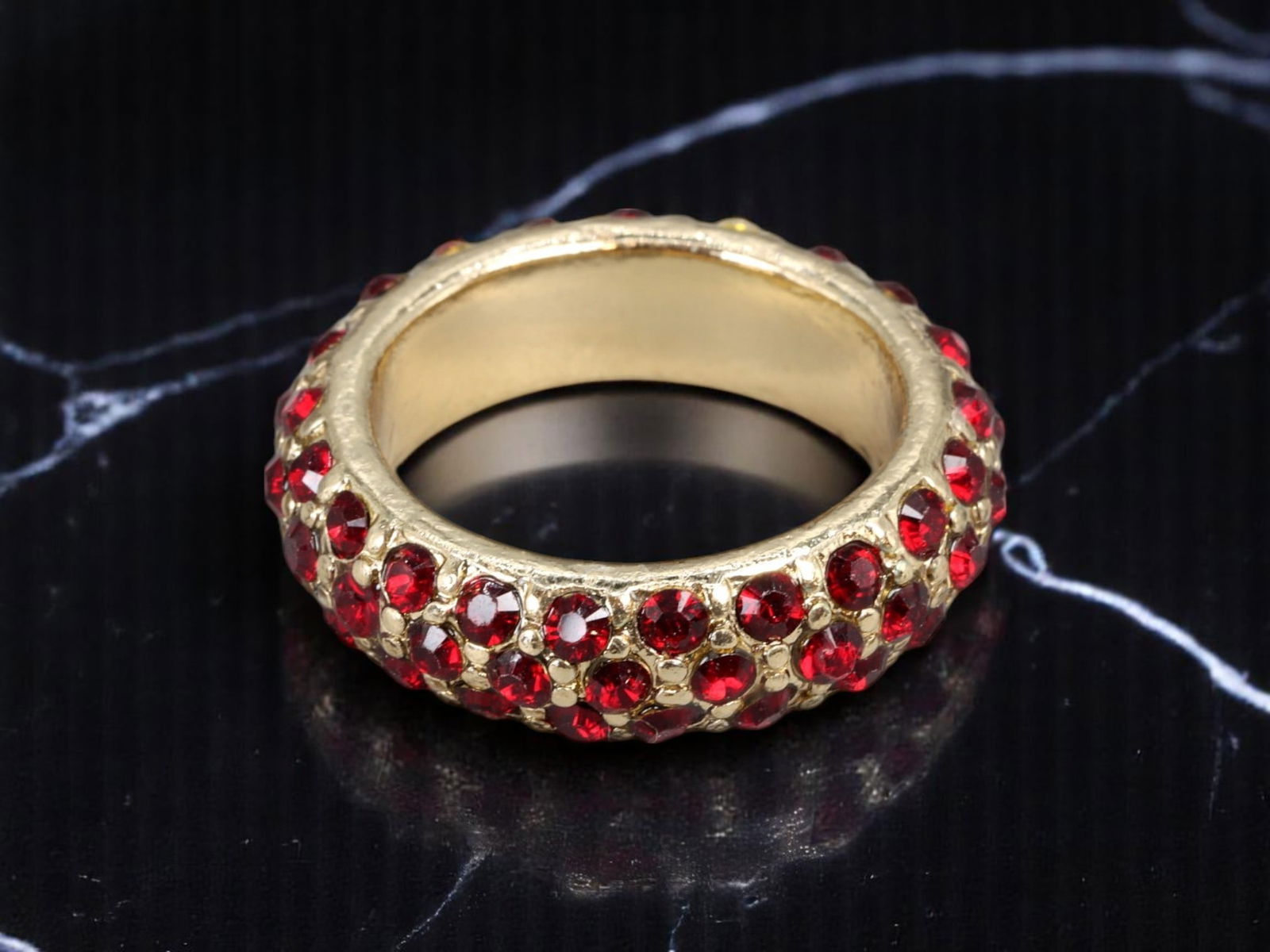 Domed Band Ring - Goldtone with Ruby-Like Pave Stones, US 8: A glamorous example of Retro Modern style, this domed band ring dazzles with its rich goldtone finish and an allover pave setting of vibrant ruby-like red stones. The bold curvature and densely set br