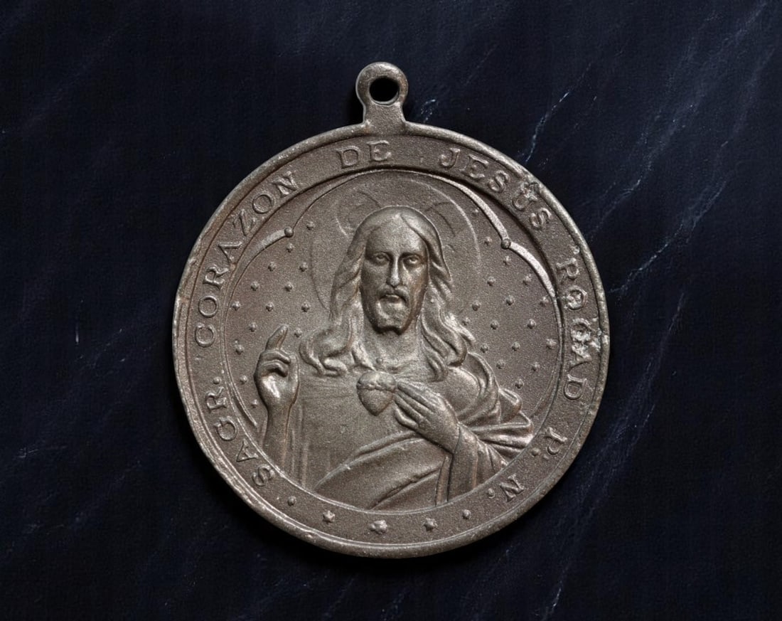 SPAIN: Sacred Heart of Jesus and Our Lady of Mount Carmel Medal, Early 20th Century, 35mm: This deeply expressive 35mm devotional medal beautifully unites two pillars of Spanish Catholic devotion: the Sacred Heart of Jesus and Our Lady of Mount Carmel. One side depicts Christ revealing His 