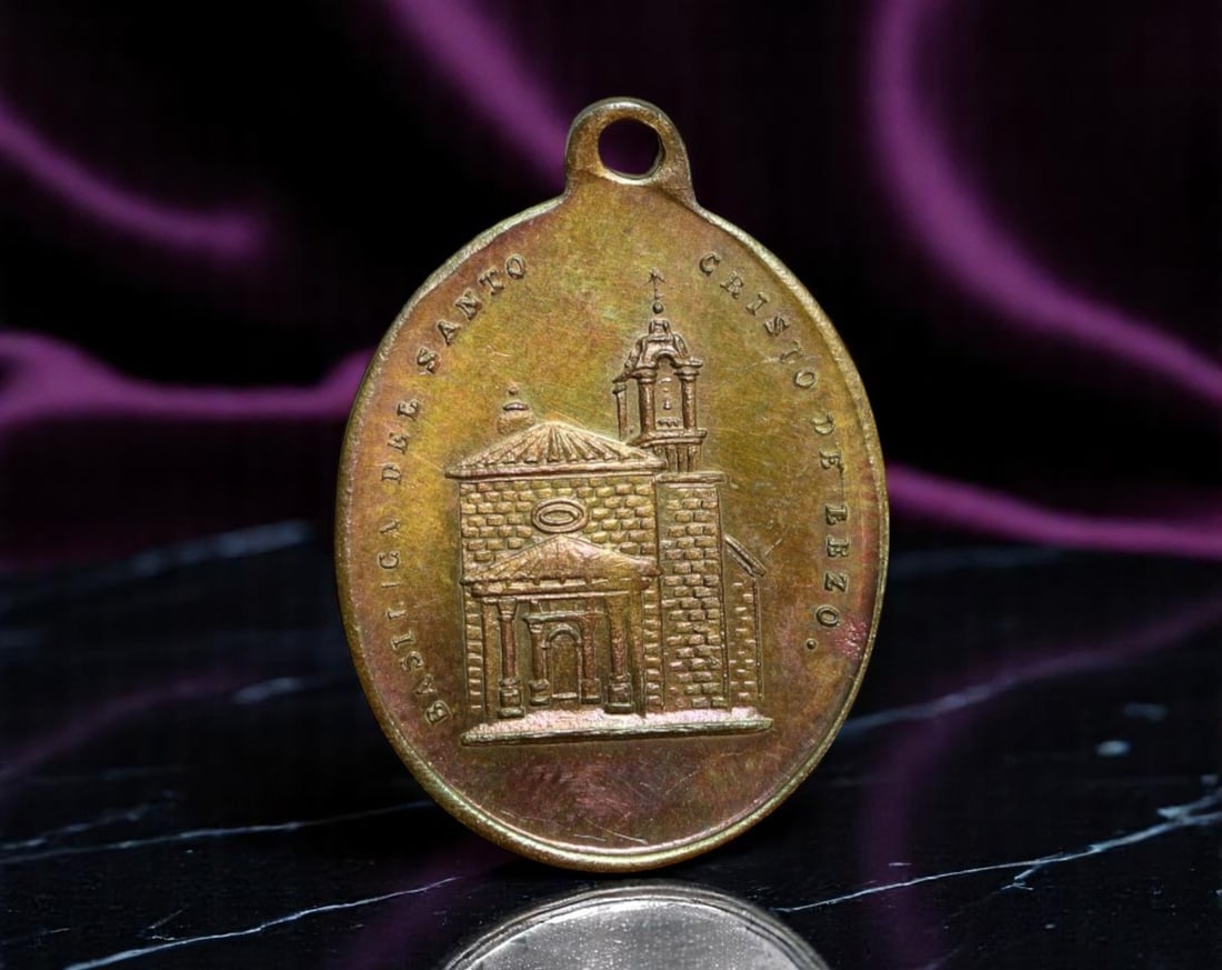 SPAIN: Cristo de Lezo - Basilica Devotional Processional Medal Coin, c.1950s, 25mm: This intricately cast devotional medal commemorates the revered Cristo de Lezo, a regional crucifix venerated in the Basque town of Lezo. The obverse features a detailed depiction of the Basilica del 