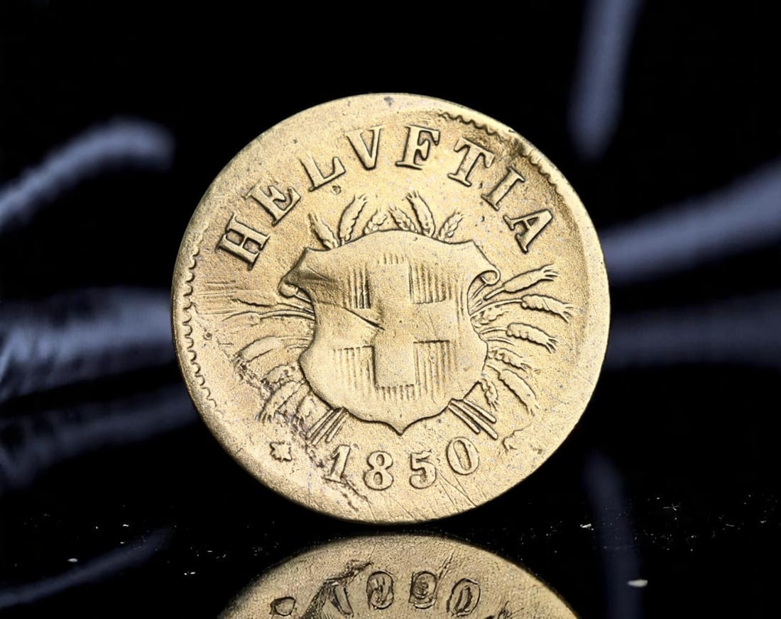 SWITZERLAND: Federal Unity - National Arms 5 Rappen Coin, 1850, 17mm: Struck in the inaugural year of Switzerland's decimal coinage system, this 5 Rappen piece is more than currency-it is a numismatic declaration of federal unity. The obverse features the radiant Swiss 
