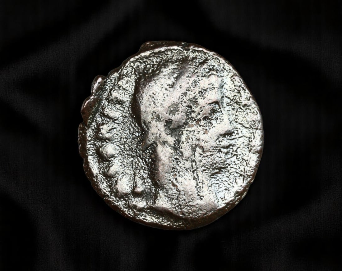 ROMAN EMPIRE: Ancient AE Coin Bronze Issue, 16mm: Issued during one of the most transformative epochs of the Roman Empire, this bronze coin embodies the endurance and adaptability of Roman statecraft across centuries. Its compact flan and timeworn su