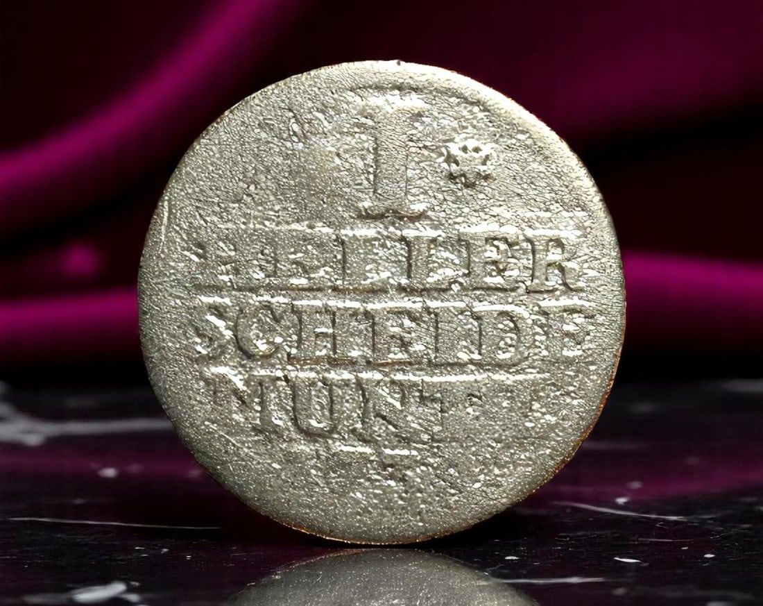 GERMANY/HESSEN-KASSEL: Friedrich I - Civic Authority Copper 1 Heller Coin, 1730s, 20mm: Issued during the principate of Friedrich I, later King of Sweden, this copper heller represents the localized monetary independence of Hessen-Kassel within the fragmented landscape of the Holy Roman