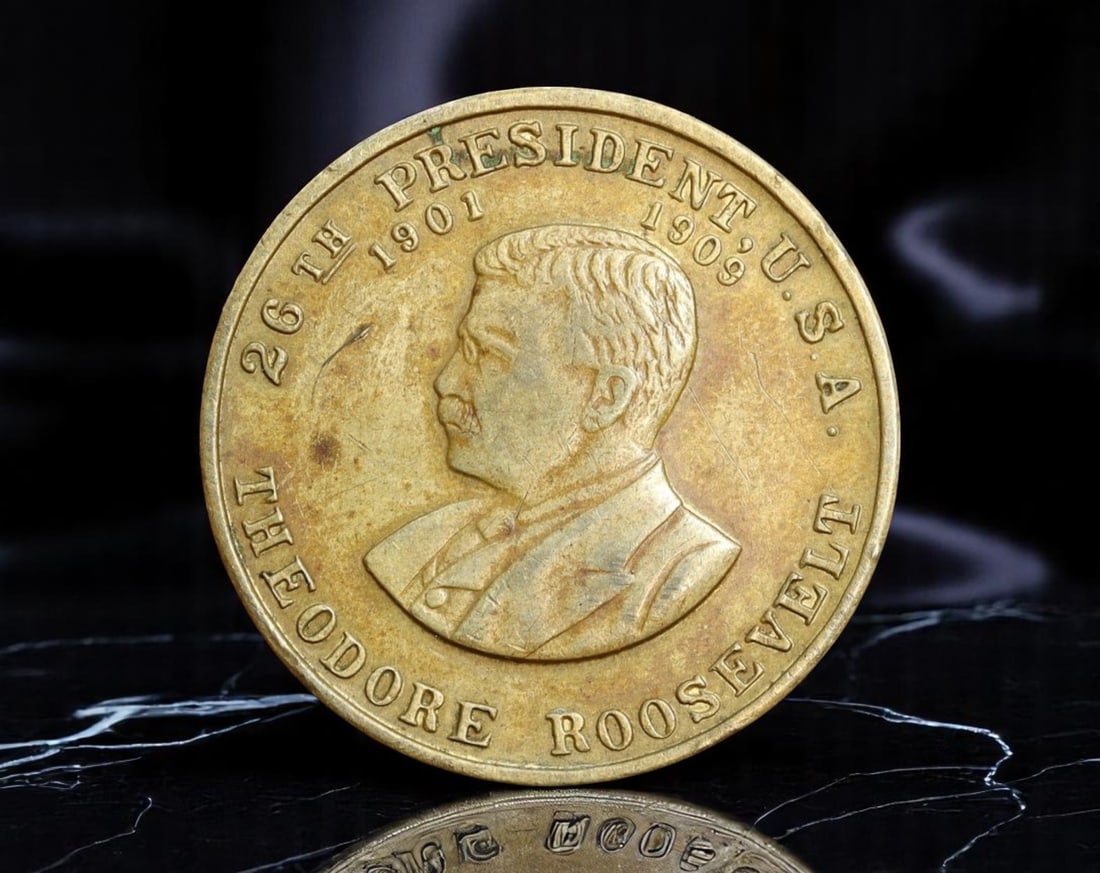 UNITED STATES: Theodore Roosevelt - Bronze Presidential Medal, 1901-1909 (26mm): This 26mm bronze medal commemorates Theodore Roosevelt, the 26th President of the United States, whose bold leadership reshaped American domestic and foreign policy in the early 20th century. The obve