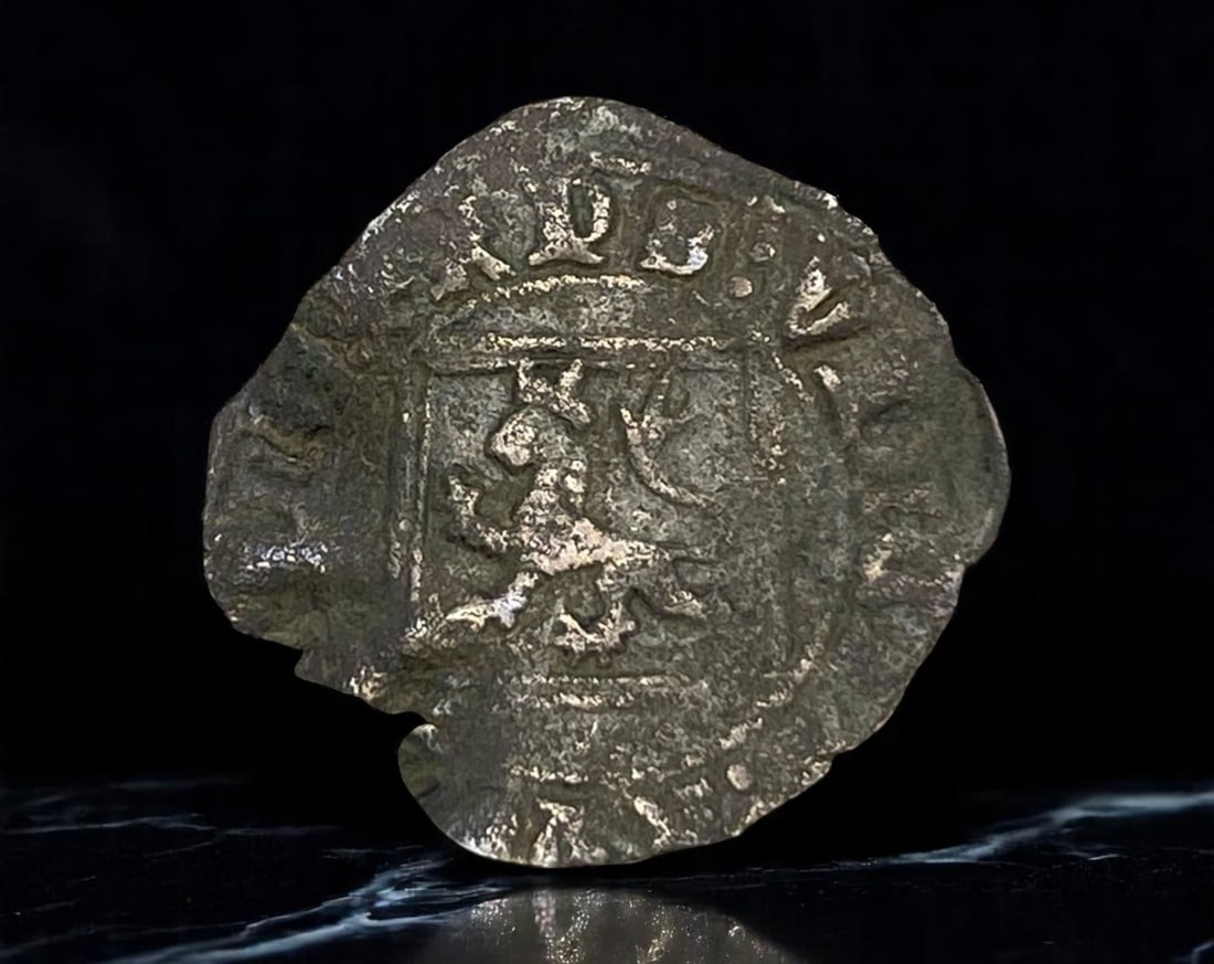 SPAIN: Enrique IV of Castile - Billon Blanca de Rombo Coin, ca. 1454-1474, Burgos Mint (20mm): Struck under the reign of Enrique IV of Castile, this billon Blanca de Rombo presents a crowned lion rampant within a quadrilobed shield, surrounded by Gothic legend, a classic feature of Castilian la