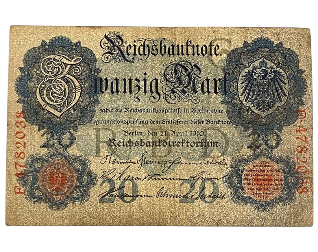 GERMANY/IMPERIAL ERA: Wilhelm II Authority - Reichsbanknote 20 Mark Banknote, 1910 Berlin, 14x9cm: Issued under the reign of Kaiser Wilhelm II, this 1910 Reichsbanknote exemplifies the grandeur and centralized power of the German Empire at its financial zenith. The front of the note blends gothic o
