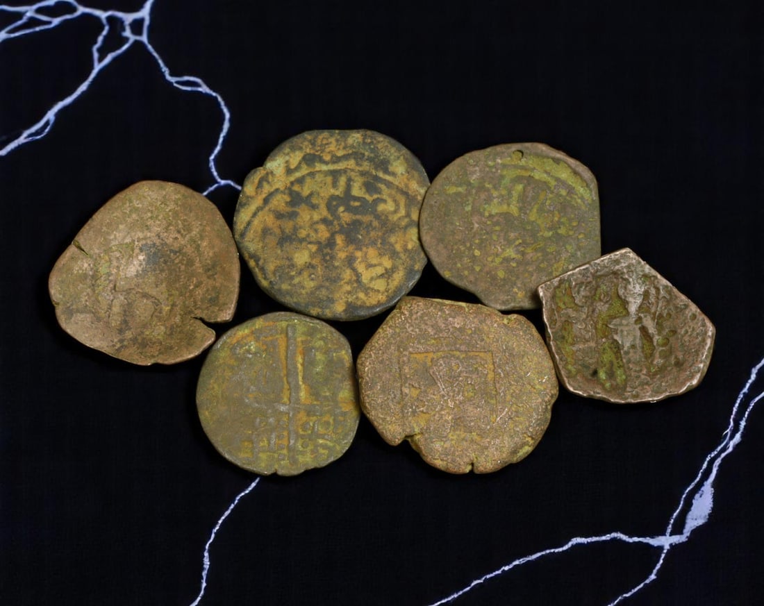 SPAIN/BYZANTIUM: Cross and Empire - Lot of 6 Medieval Bronze Coins, 12th-15th Century, 15-20mm: A striking convergence of Western and Eastern medieval power, this lot of six bronze coins presents an extraordinary journey across the kingdoms of medieval Spain and the resilient Byzantine Empire. T
