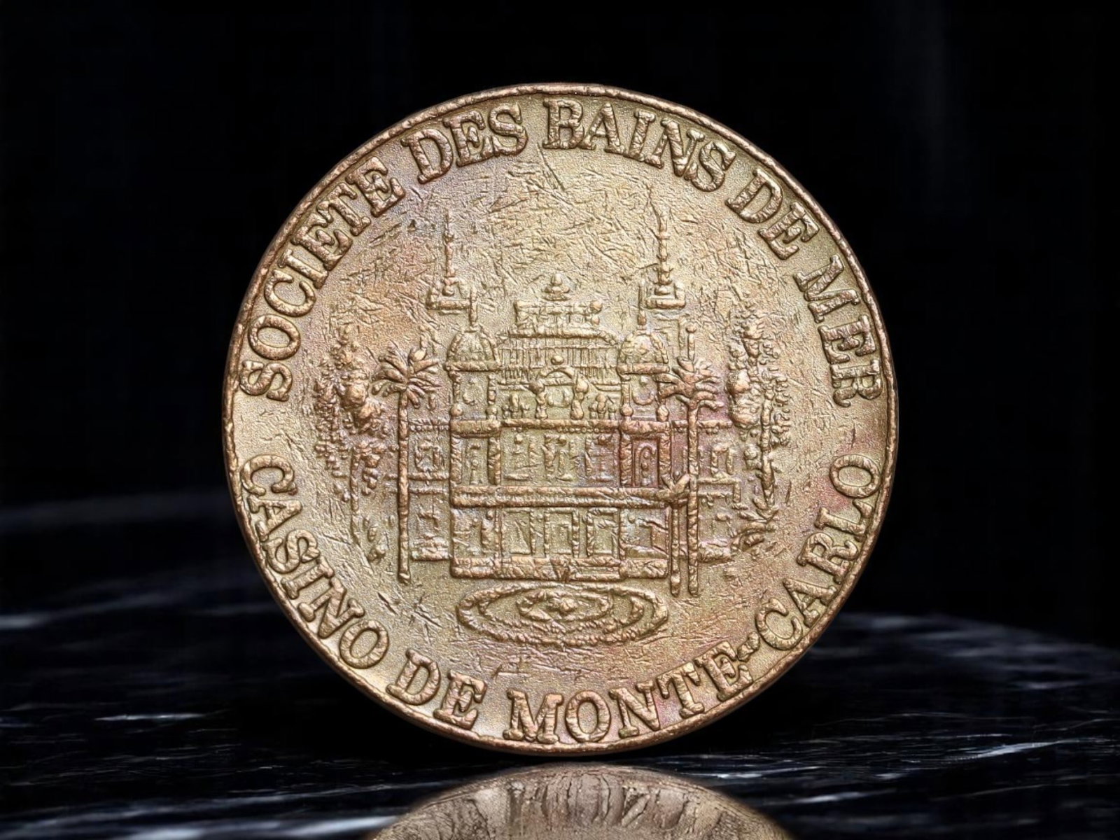 MONACO: Belle Epoque Prestige - Casino de Monte-Carlo Gaming Token, Societe des Bains de Mer, 28mm: An emblem of luxury, intrigue, and high society, this gaming token from the world-renowned Casino de Monte-Carlo captures the very essence of Monaco's golden age of glamour. Issued by the prestigious 