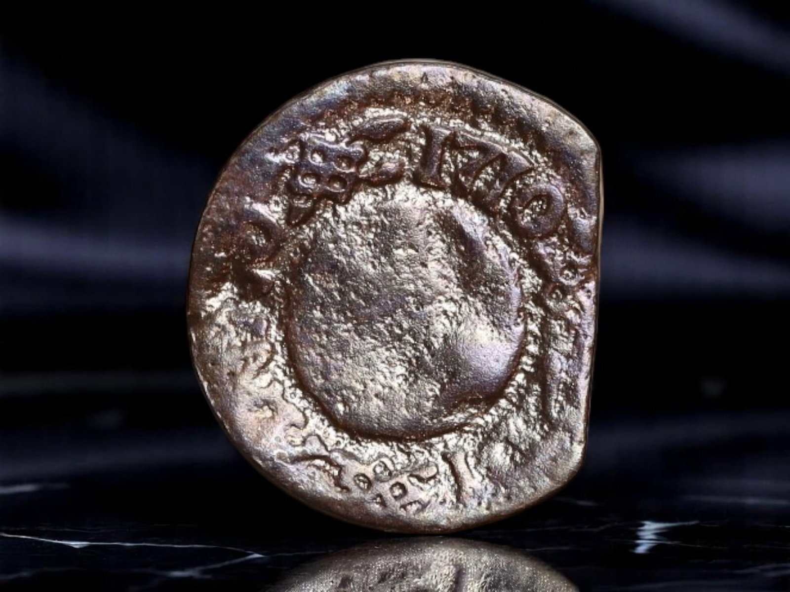 CATALONIA: Charles III Pretender - War of Spanish Succession Ardite Coin, 1709, 15mm: Struck during the volatile years of the War of Spanish Succession, this 1709 Ardite embodies Catalonia's defiance and political identity in the face of Bourbon centralization. This coin was issued und
