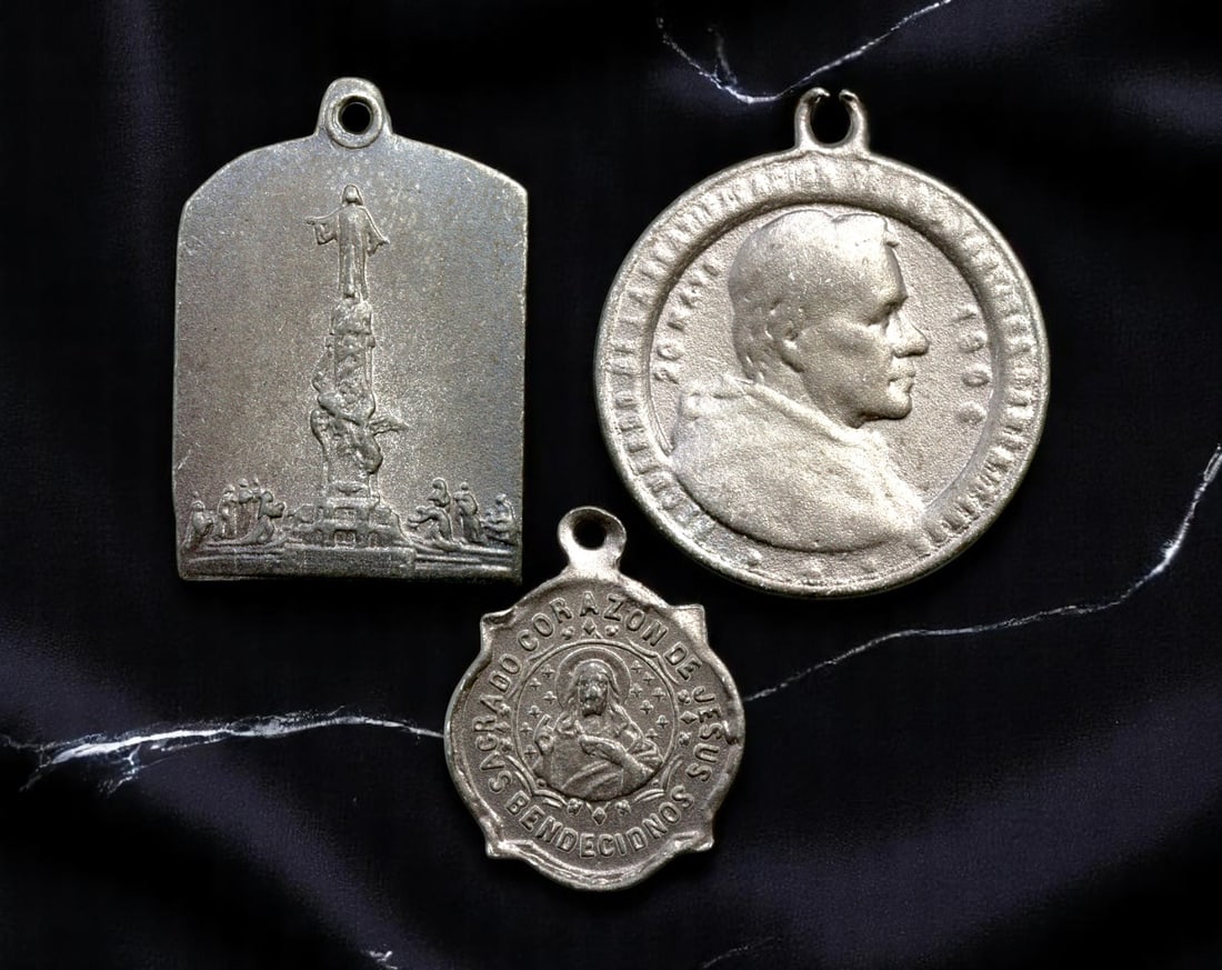 SPAIN/ITALY: Sacred Heart & Marian Shrines - 3 Papal and Pilgrimage Medallions, c.1900-1930, 21-30mm: This devotional trio spans iconic Catholic themes-from the Sacred Heart to regional Marian veneration-each medallion a window into the liturgical culture and devotional life of early 20th century Iber