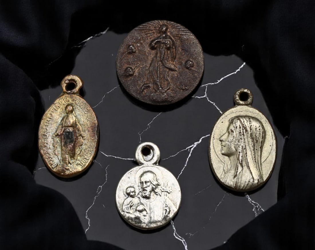 EUROPE: Marian Devotion - Micro-Medal Set (Miraculous, Lourdes, Sacred Heart), 1920s-1950s, 12-14mm: A rare and intimate set of miniature devotional medals, these four finely struck pieces reflect the deeply personal scale of early 20th-century faith practice. Included is a Miraculous Medal with clas