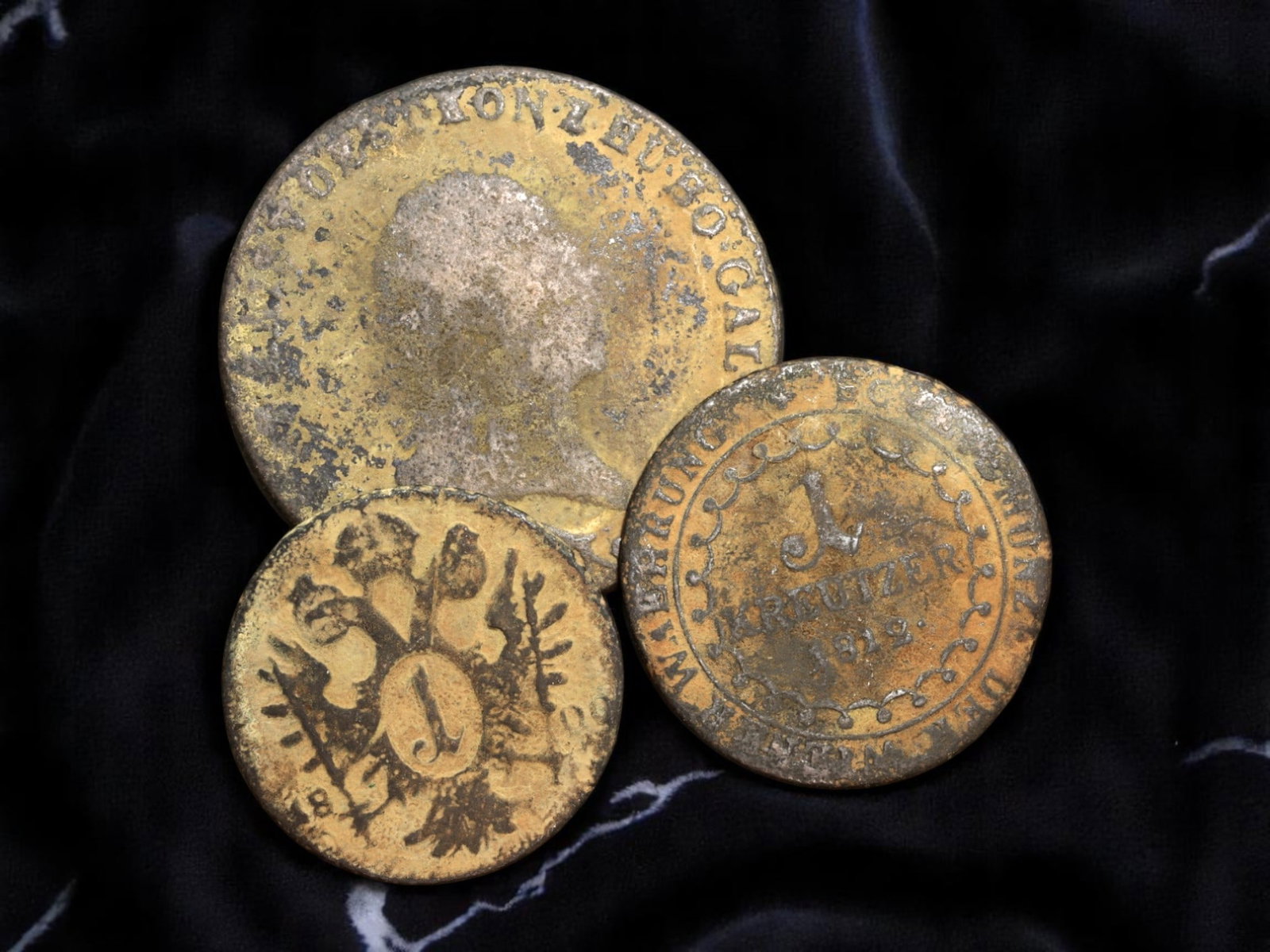 HOLY ROMAN EMPIRE/AUSTRIA: Habsburg 6 and 1 Kreutzer Coins, 1800-1812, 22-33mm: Representing both the tail end of the Holy Roman Empire and the dawn of the Austrian Empire, this trio of copper coins-one 6 Kreutzer and two 1 Kreutzer issues-bridges one of Europe's most consequenti