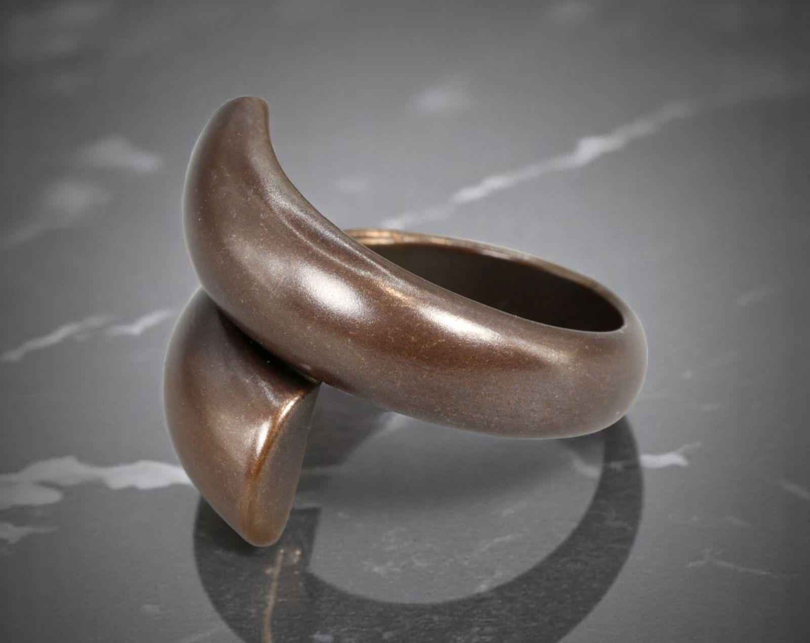 ARTISTIC MODERN STYLE: Minimalist Wrap Ring - Sculptural Curved Form in Bronzetone, Size 10: An estate piece rooted in refined simplicity, this artistic modern ring features a sweeping wrap design with softened edges and a matte bronzetone finish. The curved, crescent-like profile reflects sc