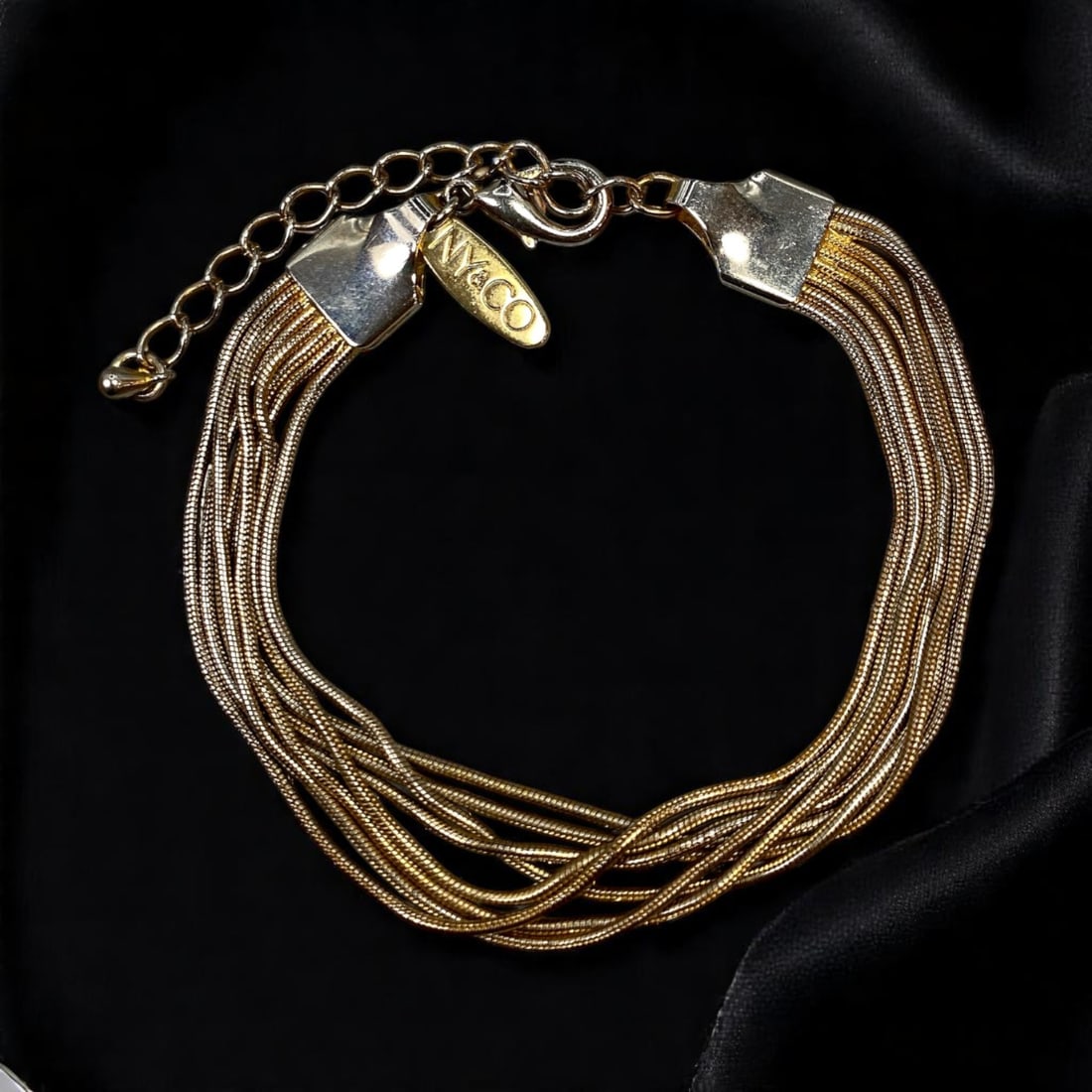 NY&CO VINTAGE ESTATE: Multi-Strand Bracelet - Goldtone Snake Chains, Layered Design 23cm: From an estate jewelry collection, this vintage NY&Co bracelet offers bold simplicity with its multi-strand design. Composed of soft, fluid goldtone snake chain strands, the bracelet drapes elegantly 