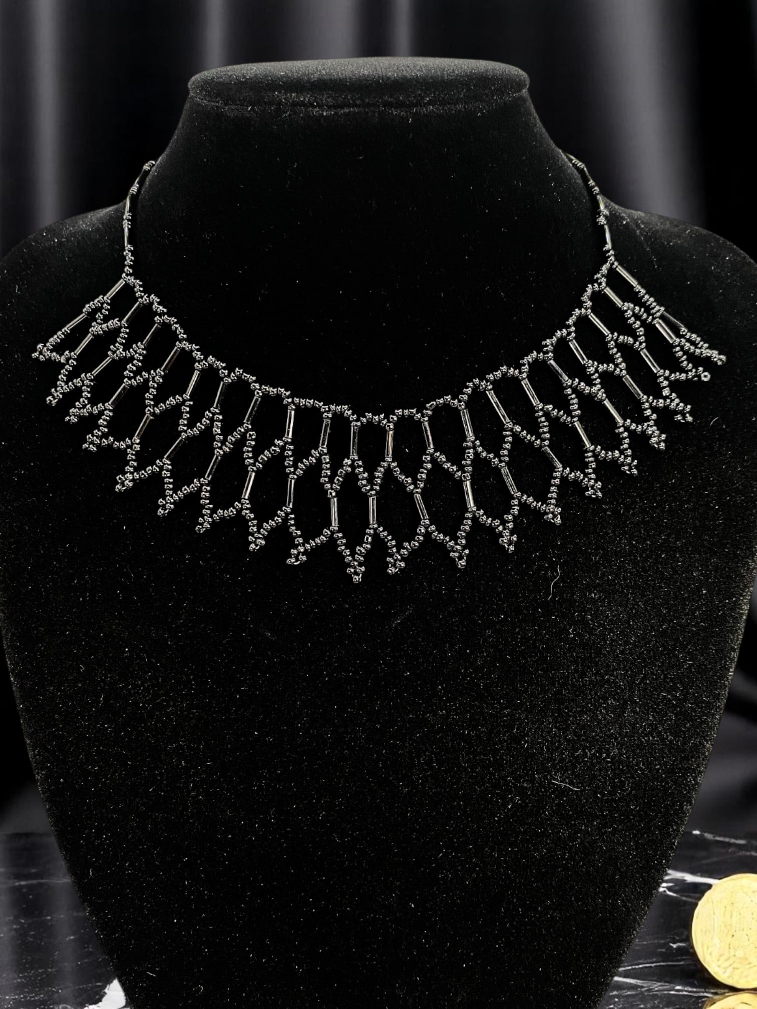 ELEGANT ARTISAN DESIGN: Black Beaded Filigree Necklace, 37cm: A sophisticated statement of craftsmanship, this exquisite black beaded necklace radiates vintage elegance and modern refinement. Hand-assembled with delicate black cylindrical and seed beads, the nec