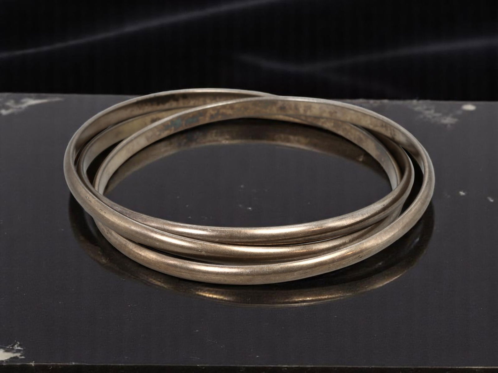 MID-CENTURY: Estate Bangle Lot - Trio of Silver Classic Bangles, 41g, 7.5cm: A timeless estate jewelry find, this vintage mid-century lot features a trio of sleek silvertone bangles, perfect for stacking or wearing individually. The minimalist, rounded profiles embody understa
