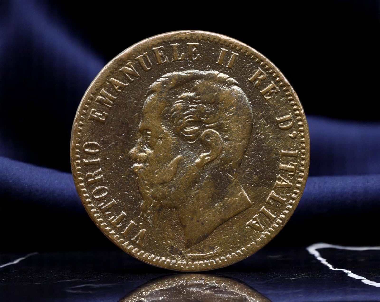 ITALY: Vittorio Emanuele II - Post-Unification 10 Centesimi Coin, 1867, 30mm: Struck in 1867, this 10 Centesimi coin features the authoritative portrait of Vittorio Emanuele II, Italy's first king following unification, boldly facing left with regal composure. The legend encirc