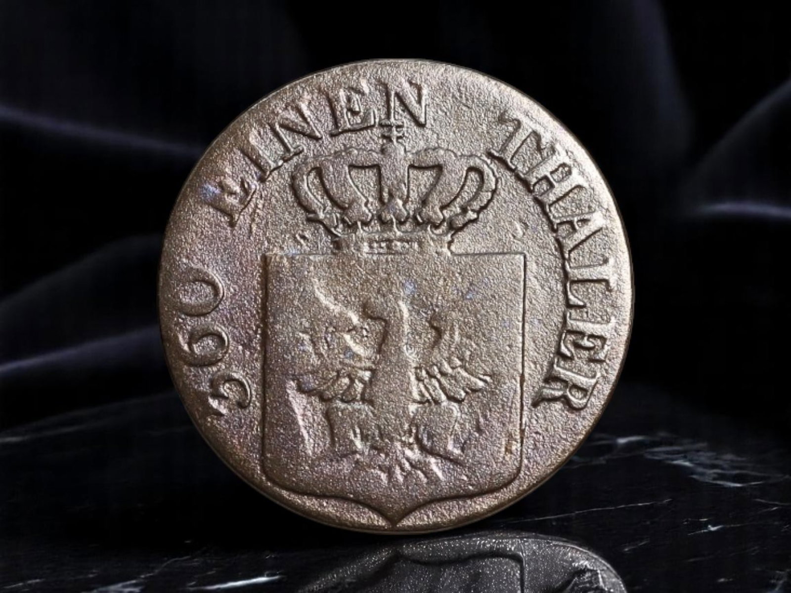 PRUSSIA: Friedrich Wilhelm III - Armorial Strength 1 Pfennig Coin, 1840, 17mm: Struck during the closing year of Friedrich Wilhelm III's long reign, this copper 1 Pfennig coin embodies the enduring symbolism of Prussian sovereignty and resilience. The obverse boldly presents the