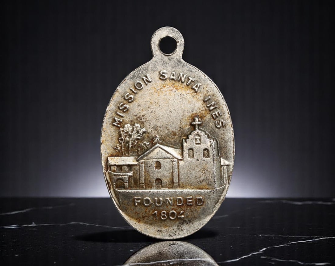 USA: California Mission Legacy - Santa Ines & Saint Agnes Devotional Medal Coin, ND, 25mm: Struck as a tribute to early Catholic missionary efforts in Alta California, this devotional medal connects faith, heritage, and martyrdom. One side depicts Mission Santa Ines, founded in 1804 as the 