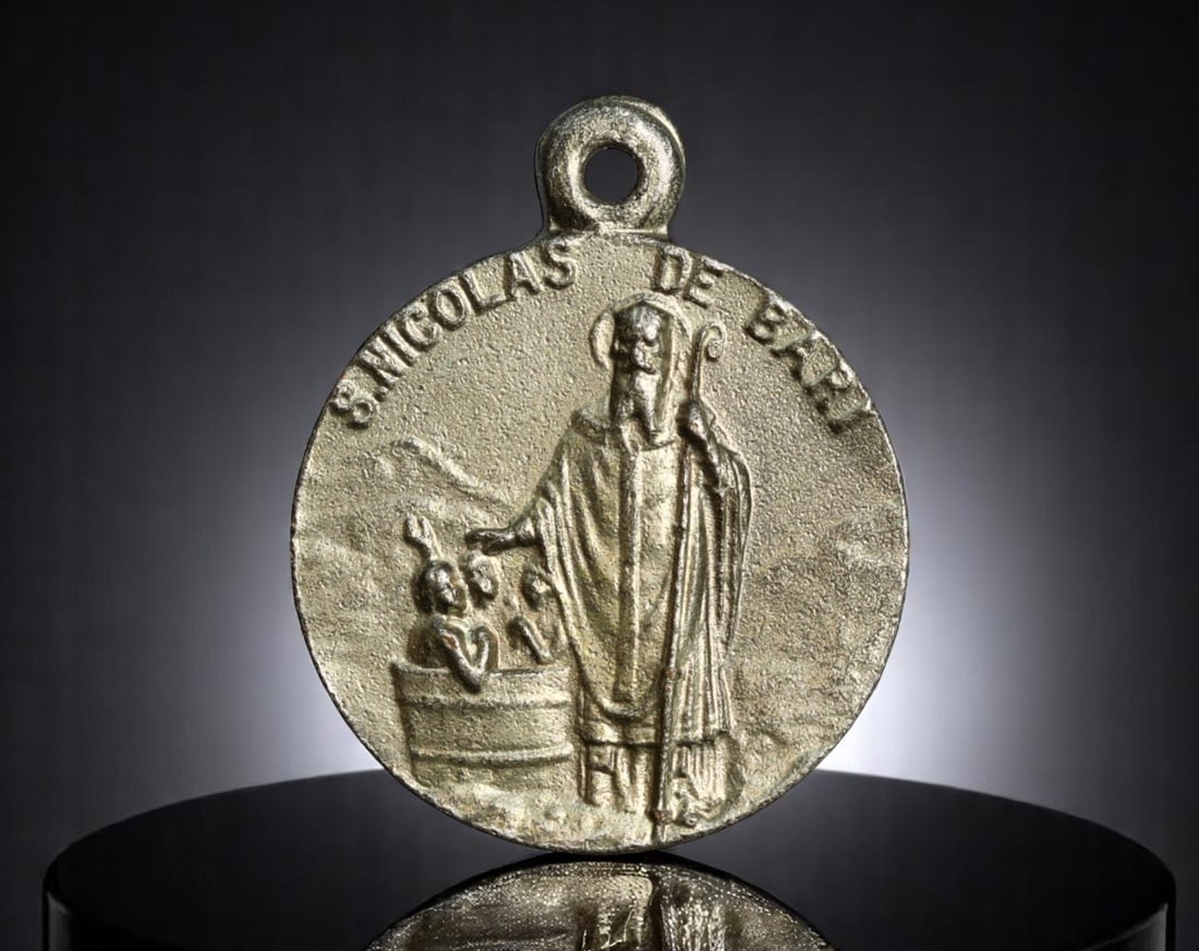 ITALY: Saint Nicholas of Bari - Protector of the Innocents Devotional Medal, c.1940s, 22mm: This devotional medal honors Saint Nicholas of Bari, revered for his miraculous acts of mercy and compassion. He is depicted here in episcopal robes, extending his blessing toward three young boys eme