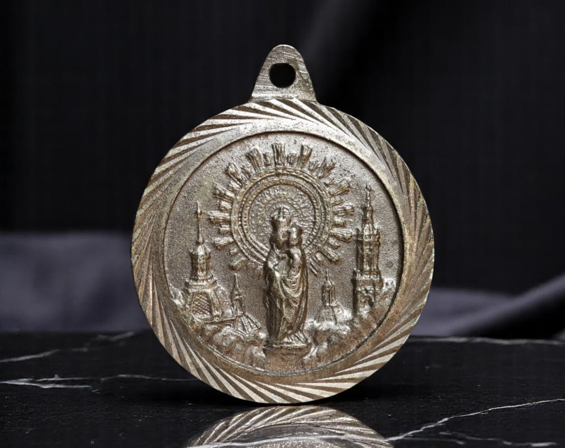 SPAIN: Sacred Heart & Virgen del Pilar - Dual Devotional Medal of Faith and Protection, ca. 1950s,: This finely cast Spanish devotional medal harmonizes two potent symbols of Catholic devotion: the Sacred Heart of Jesus, radiant with divine mercy, and the Virgen del Pilar, the celestial patroness of